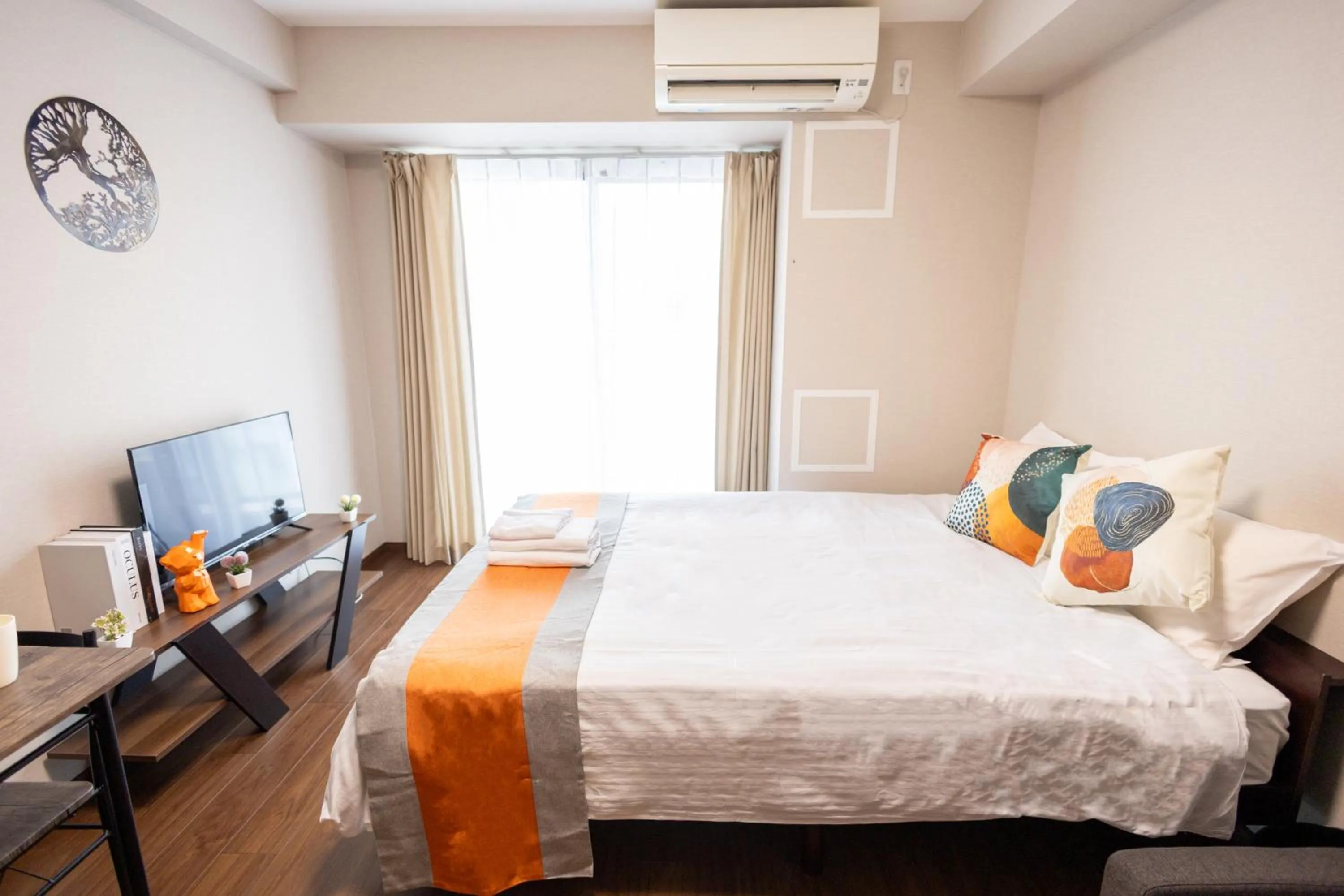 Bed in nestay apartment osaka ebisu