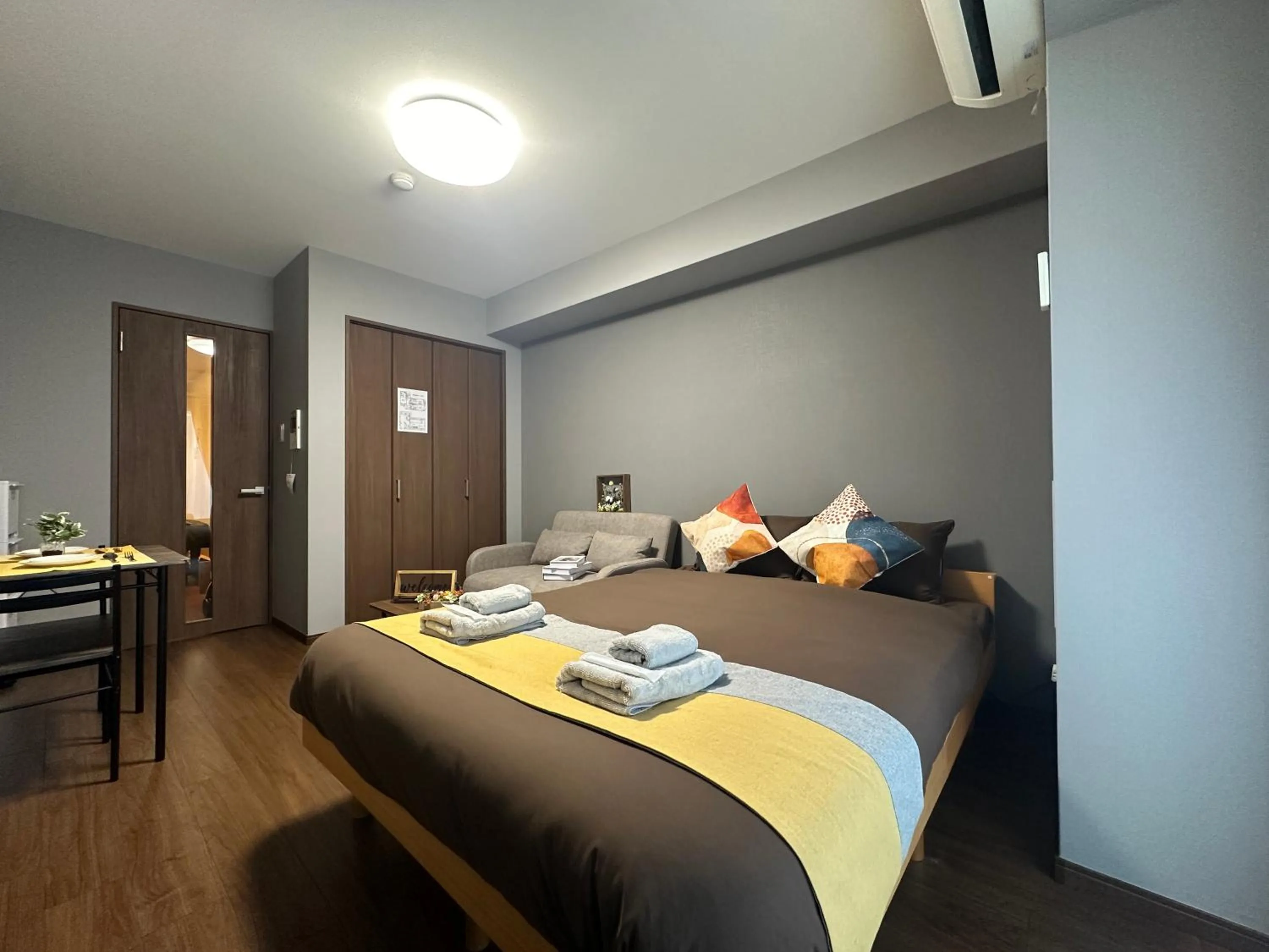 Bed in nestay apartment osaka ebisu