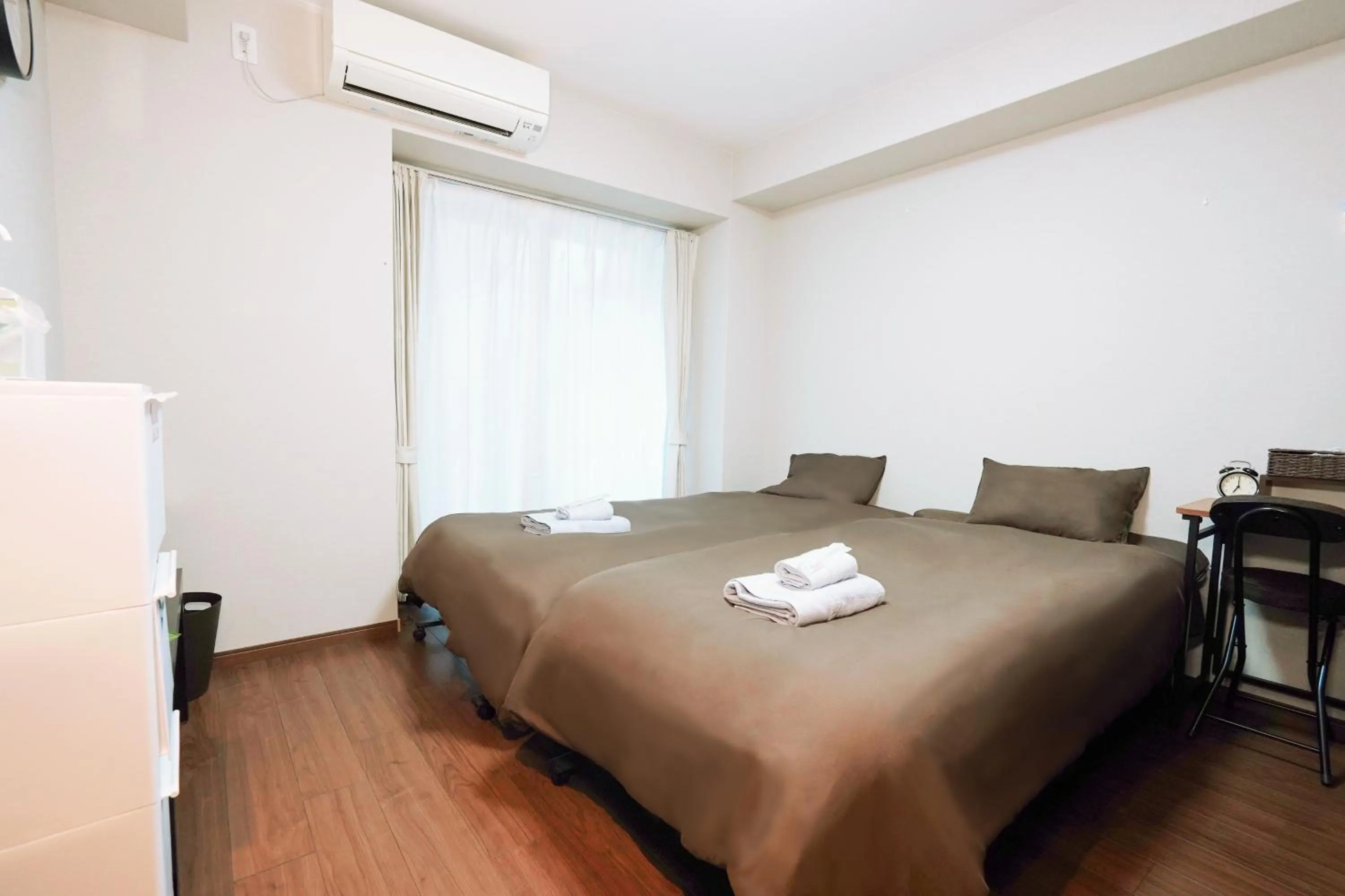 Bed in nestay apartment osaka ebisu