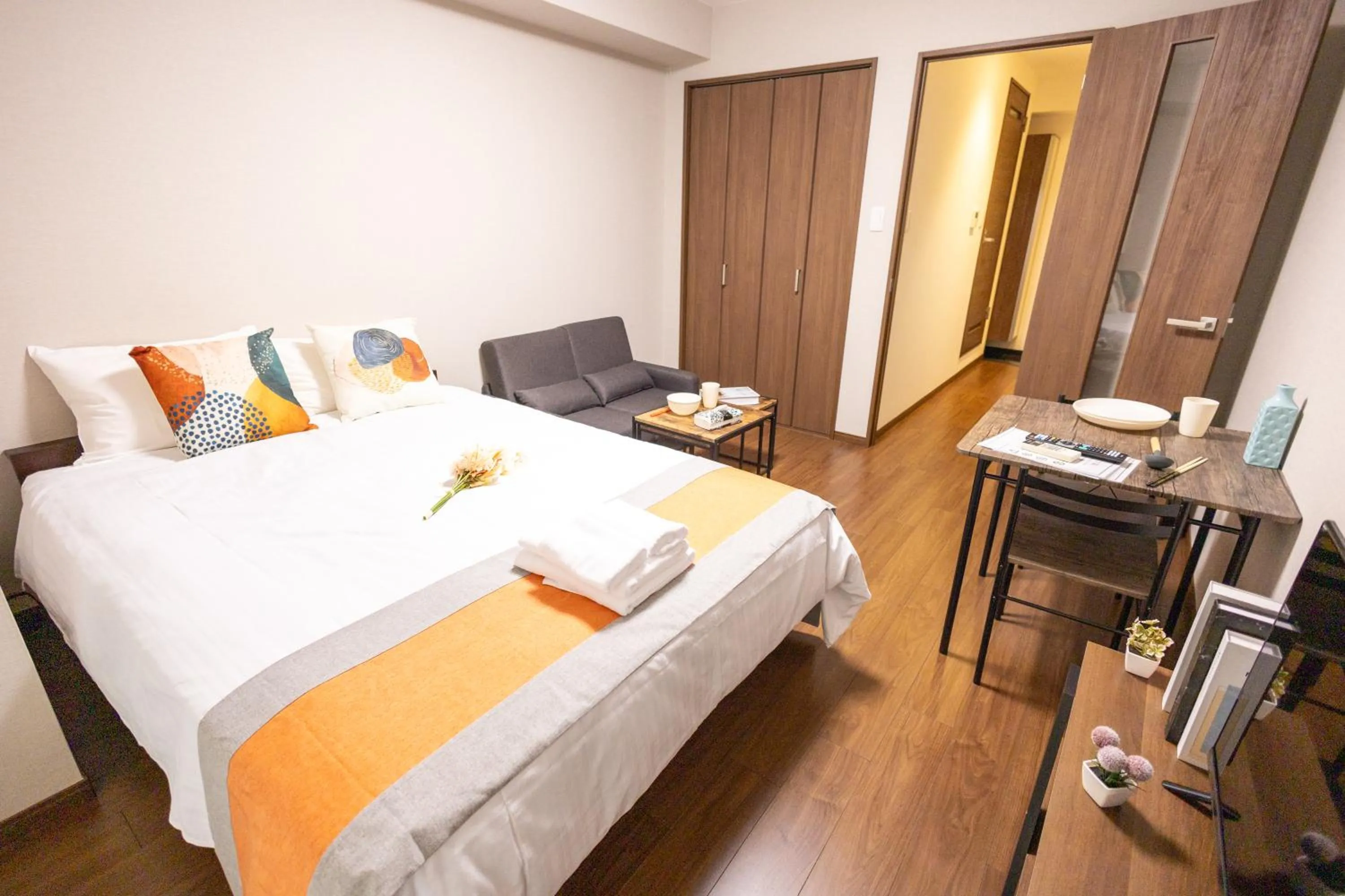 Bed in nestay apartment osaka ebisu