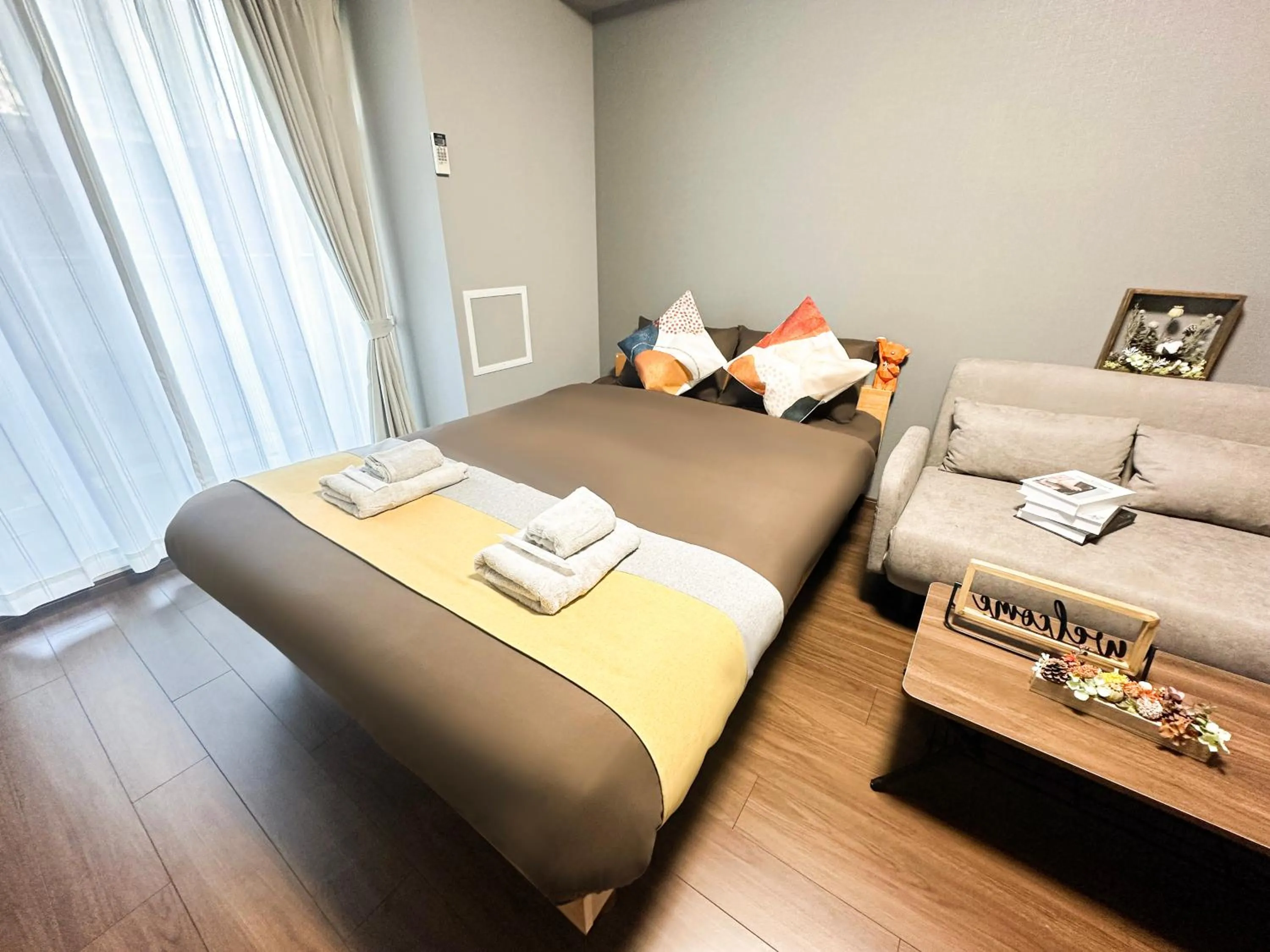 Bed in nestay apartment osaka ebisu