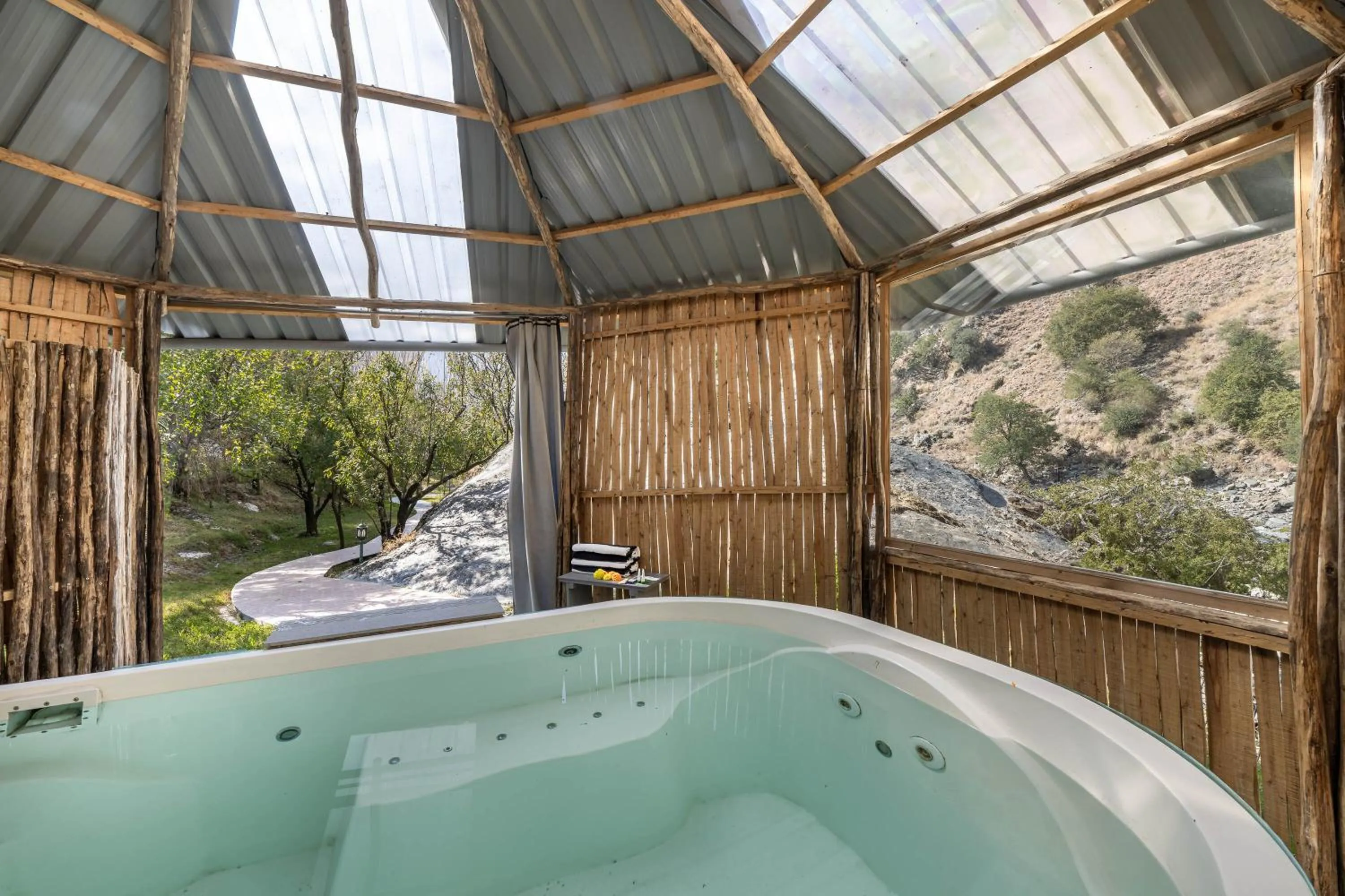 Hot Tub in Echor Palm Bliss Riverside Resort & Spa Kasol