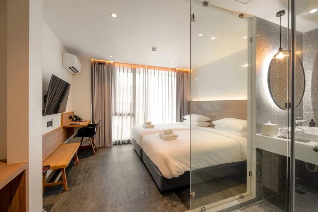 Bed in ZEN MASTER HOTEL