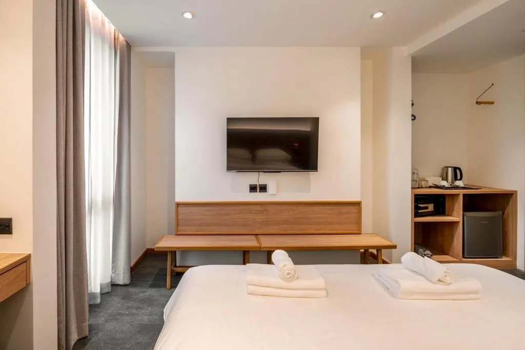 Bed in ZEN MASTER HOTEL