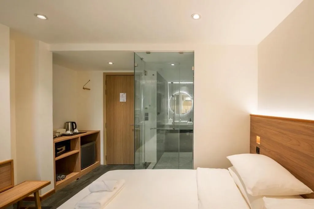 Bed in ZEN MASTER HOTEL