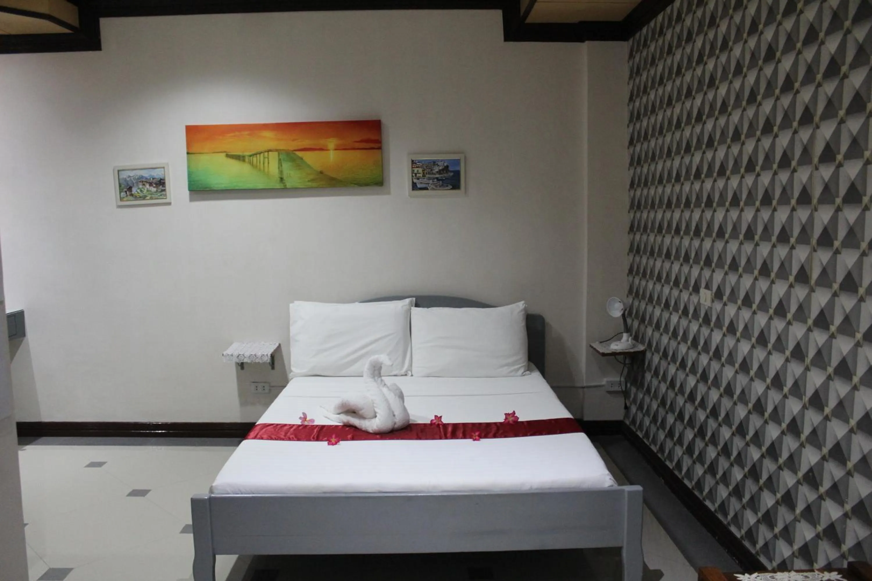 Bed in LORELEI BEACH RESORT