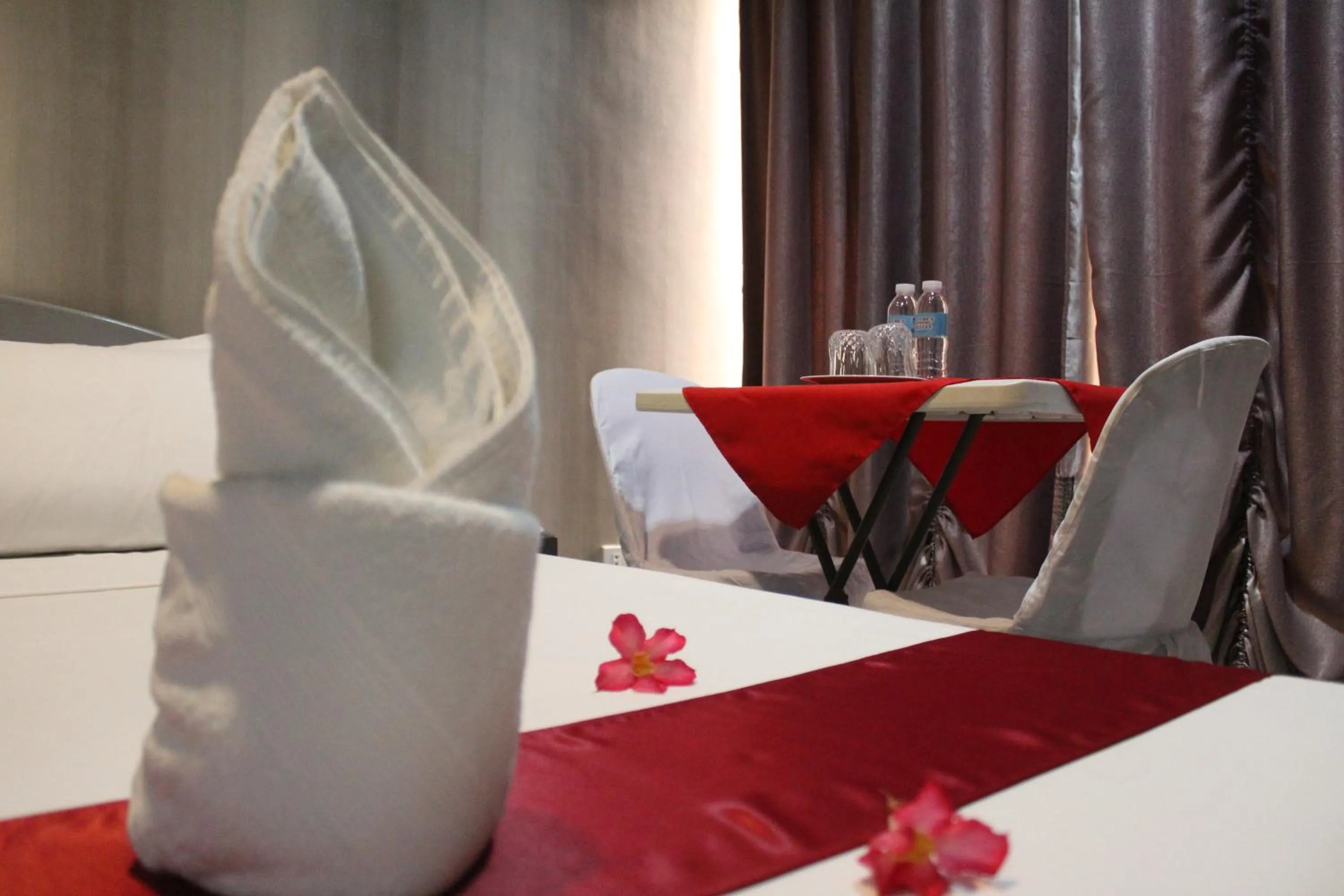 Bed in LORELEI BEACH RESORT