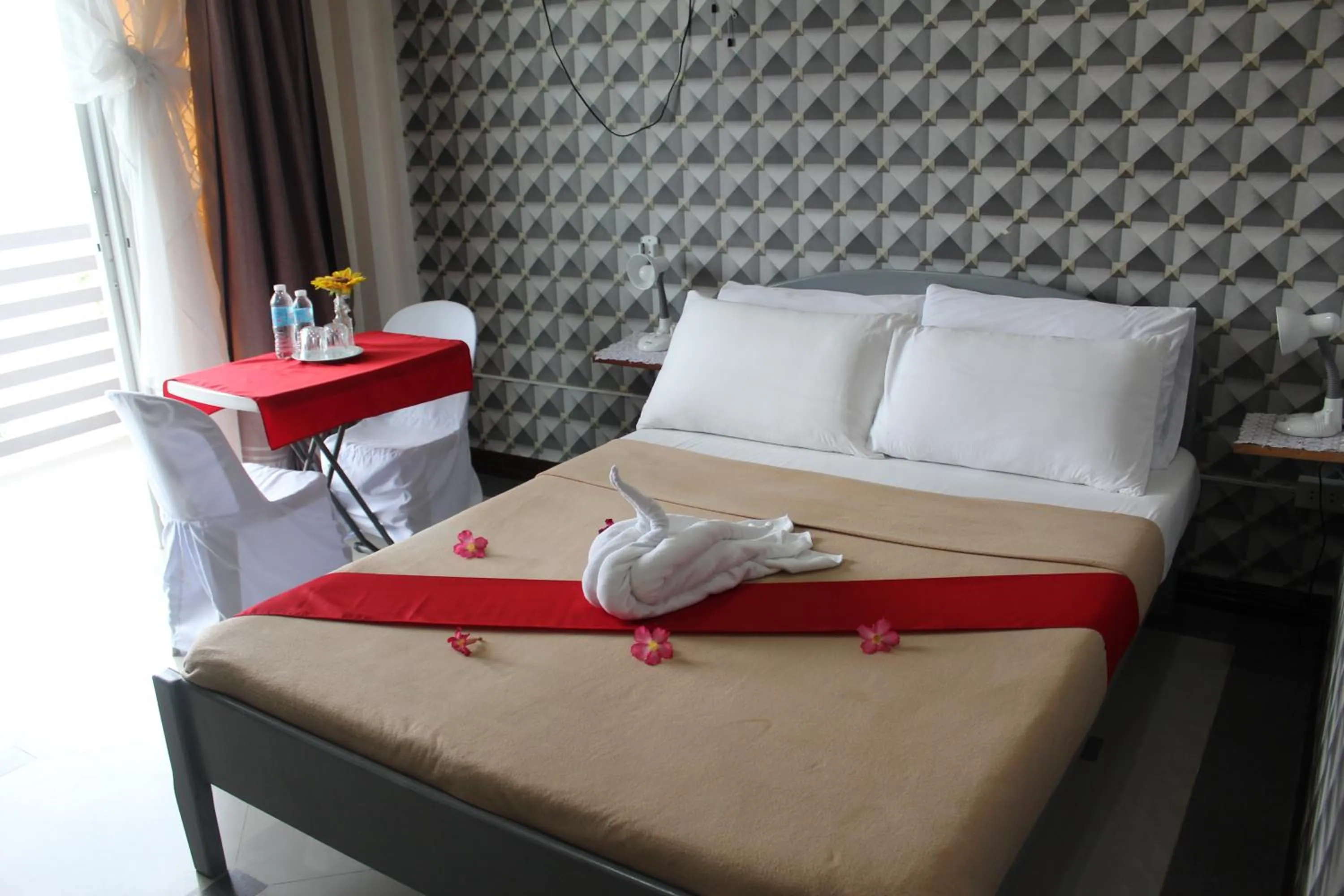 Bed in LORELEI BEACH RESORT