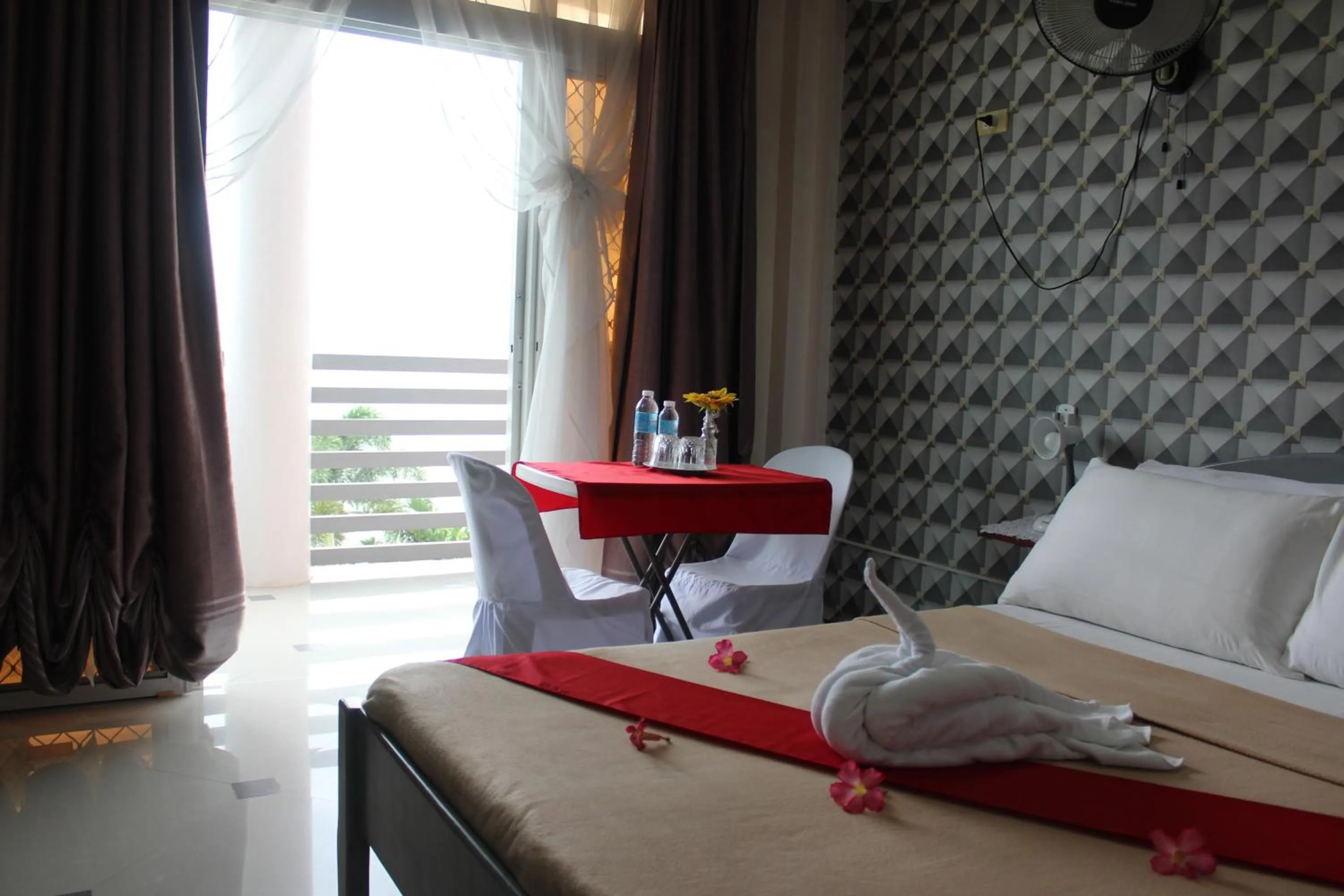 Bed in LORELEI BEACH RESORT