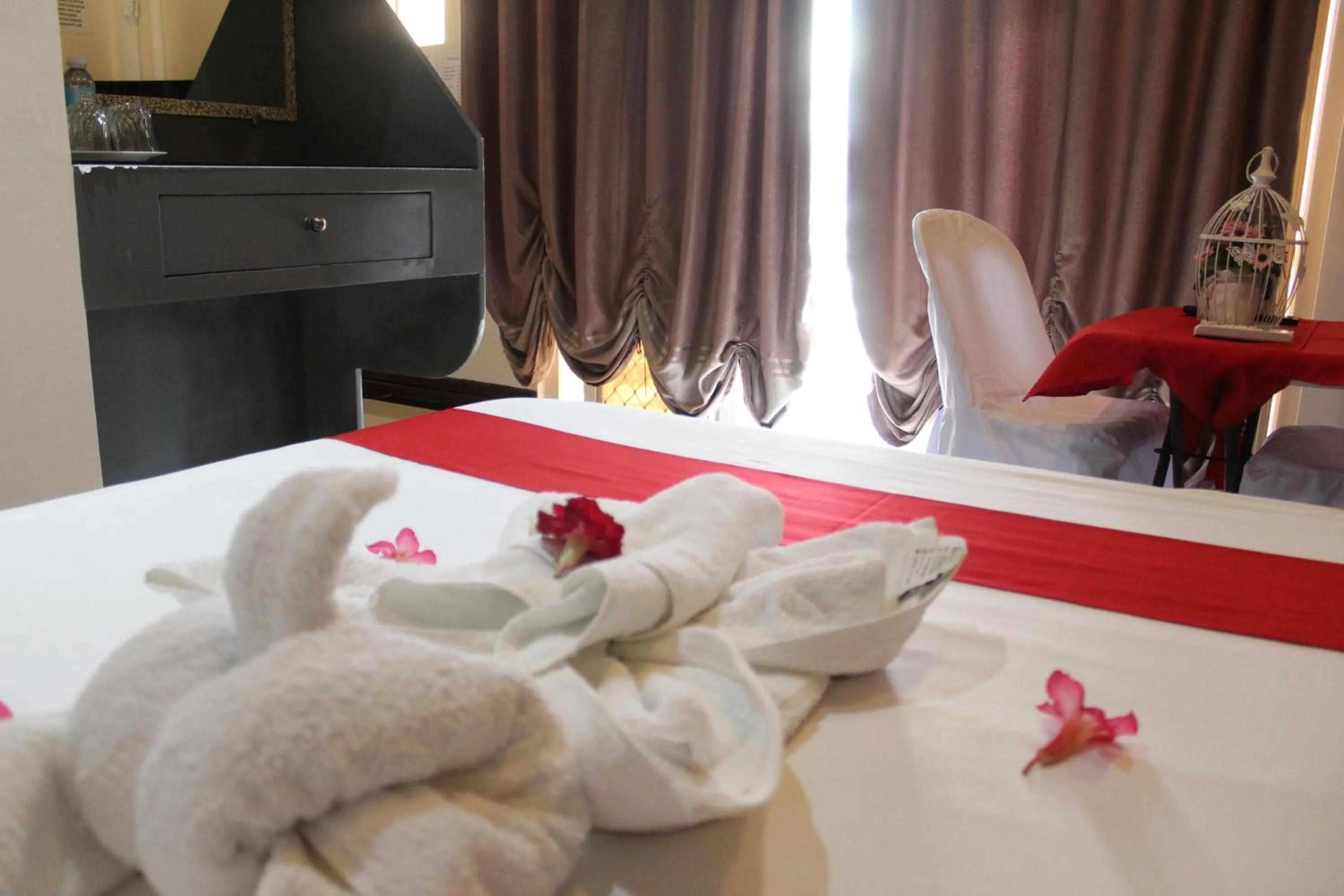 Bed in LORELEI BEACH RESORT