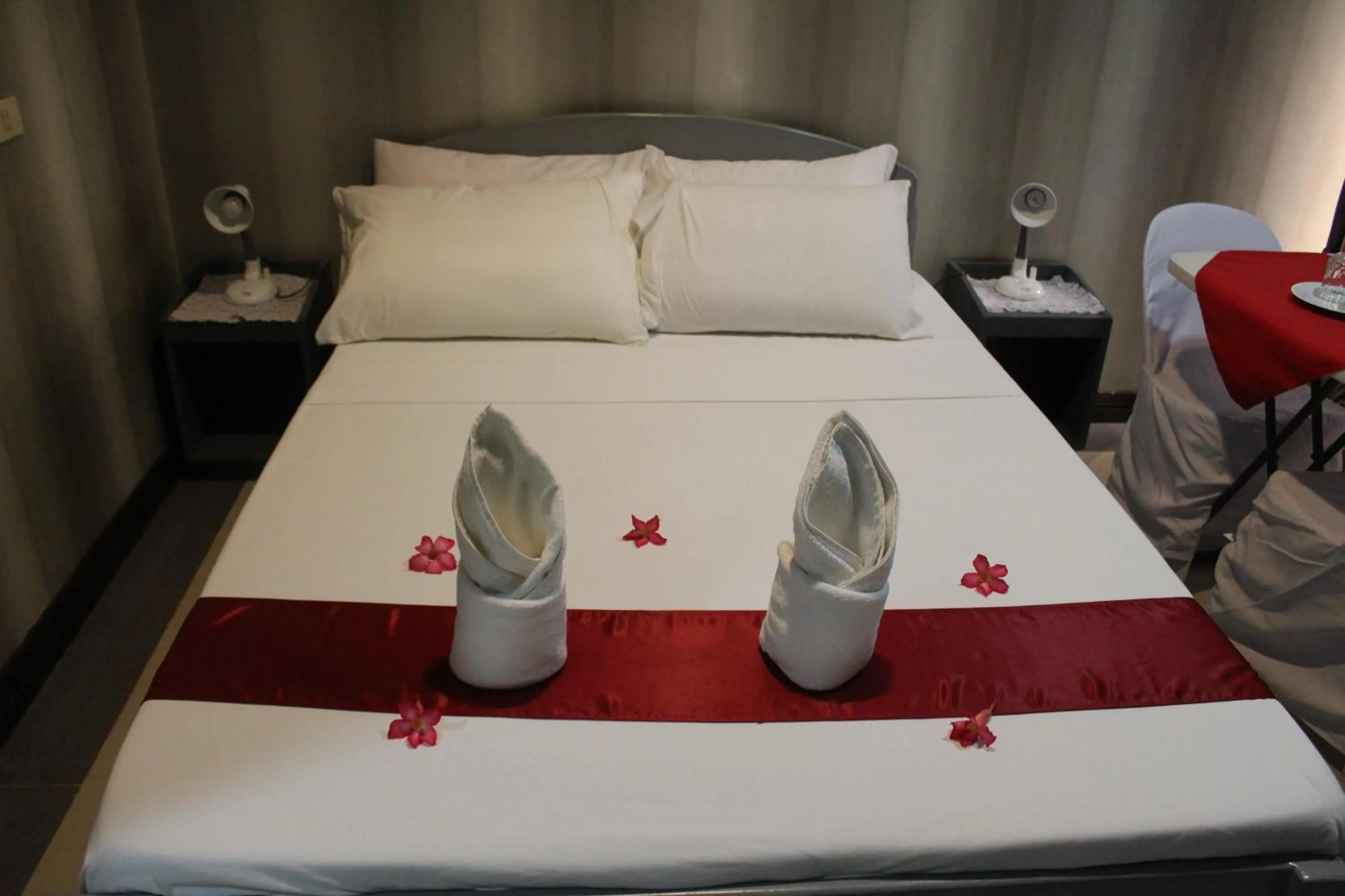 Bed in LORELEI BEACH RESORT