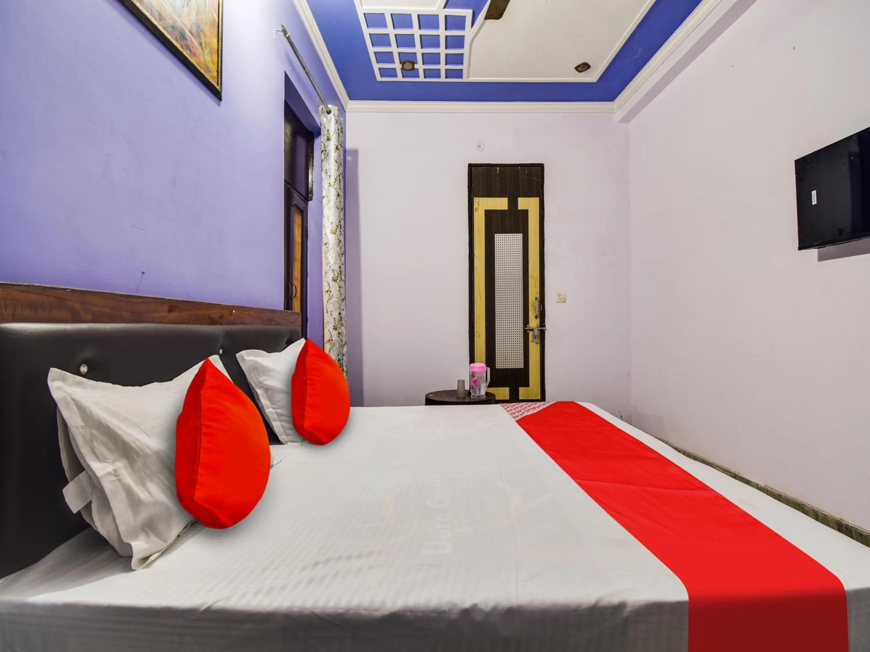 Bedroom in Hotel O SHYAM RESIDENCY