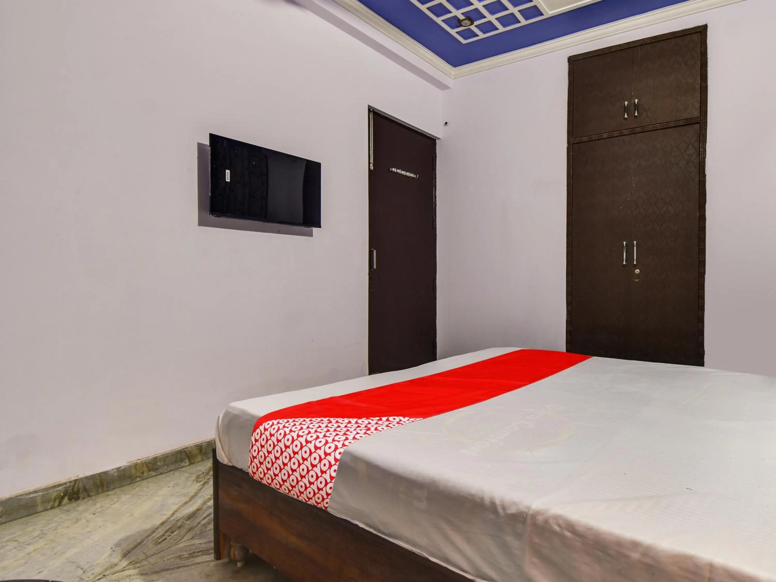 Bedroom in Hotel O SHYAM RESIDENCY
