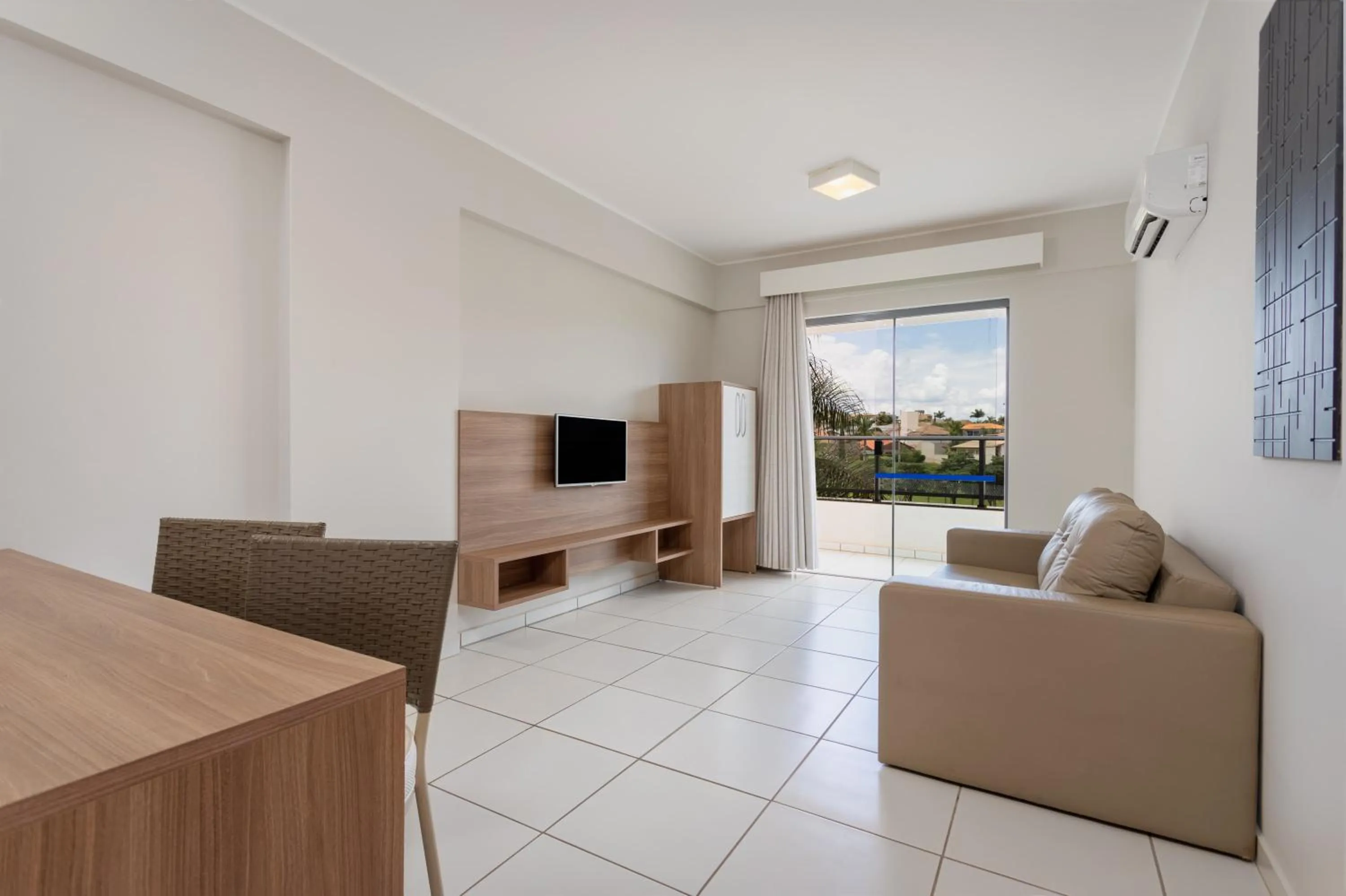 Living room in Wyndham Olímpia Royal Hotels