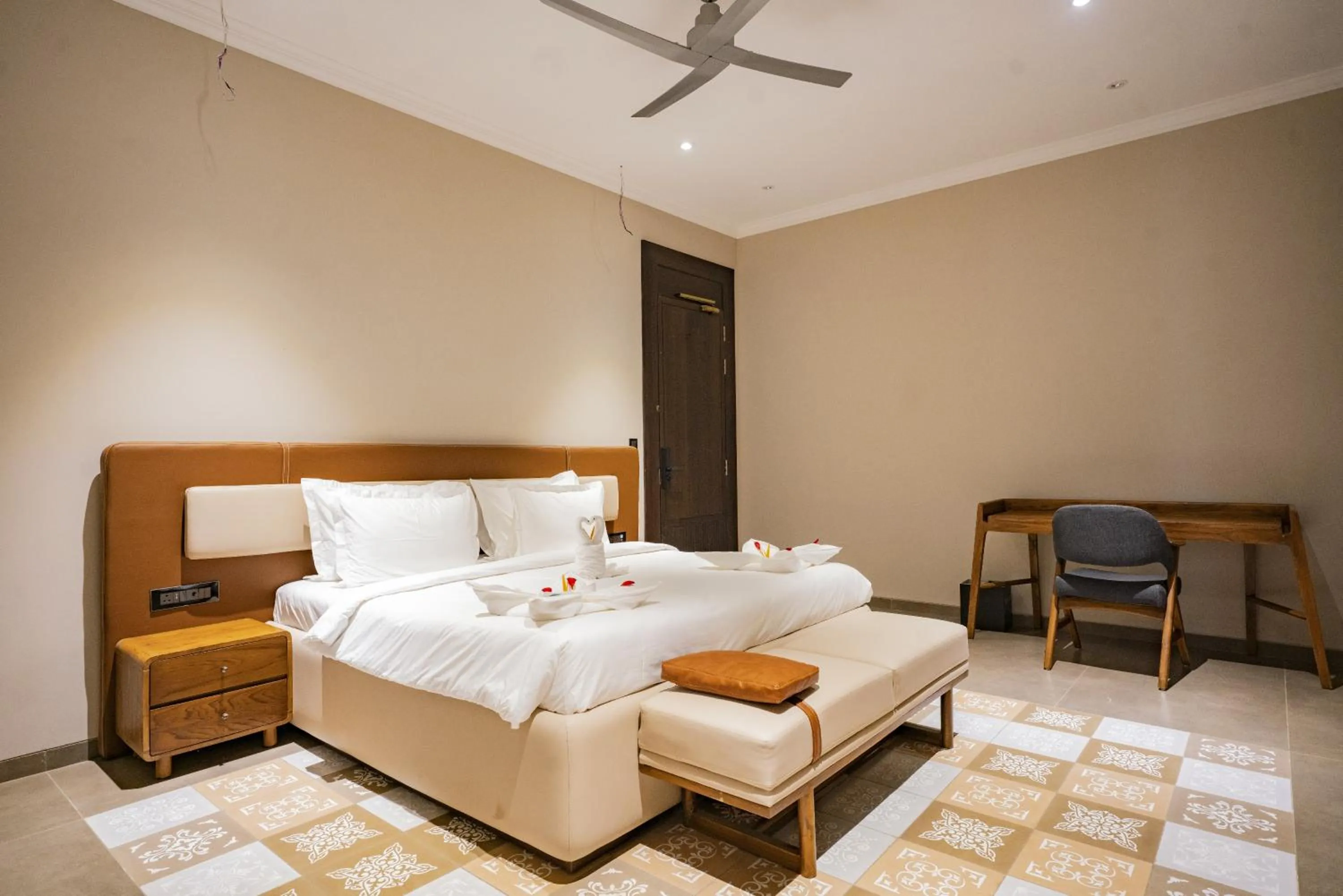 Seating area, Bed in Maira Resort and Convention Centre