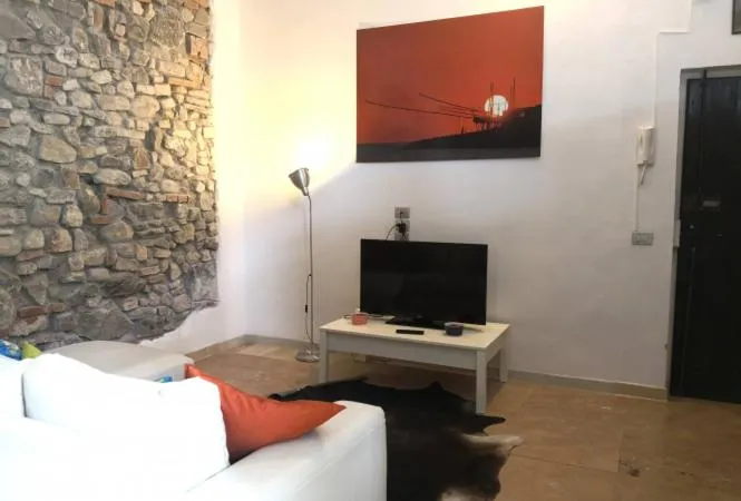 Communal lounge/ TV room in Flospirit - Casa Ersilia