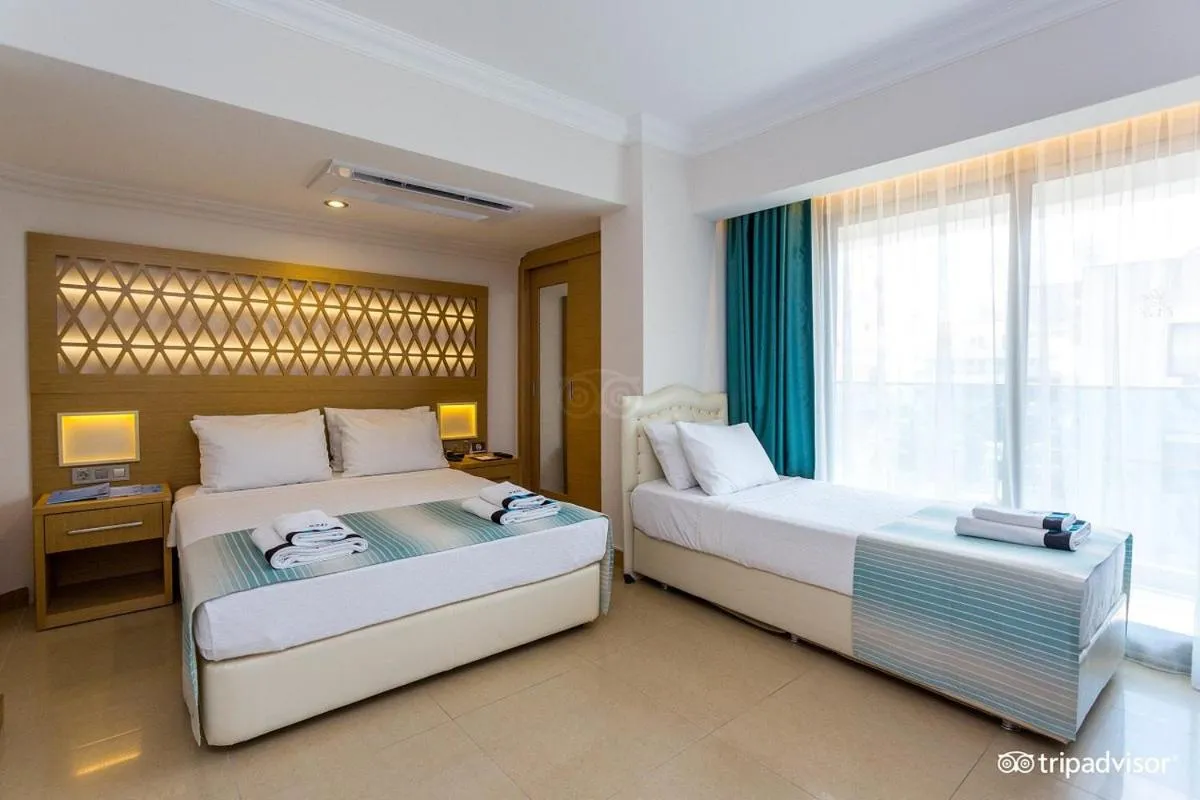 Bed in Aurasia Design Hotel