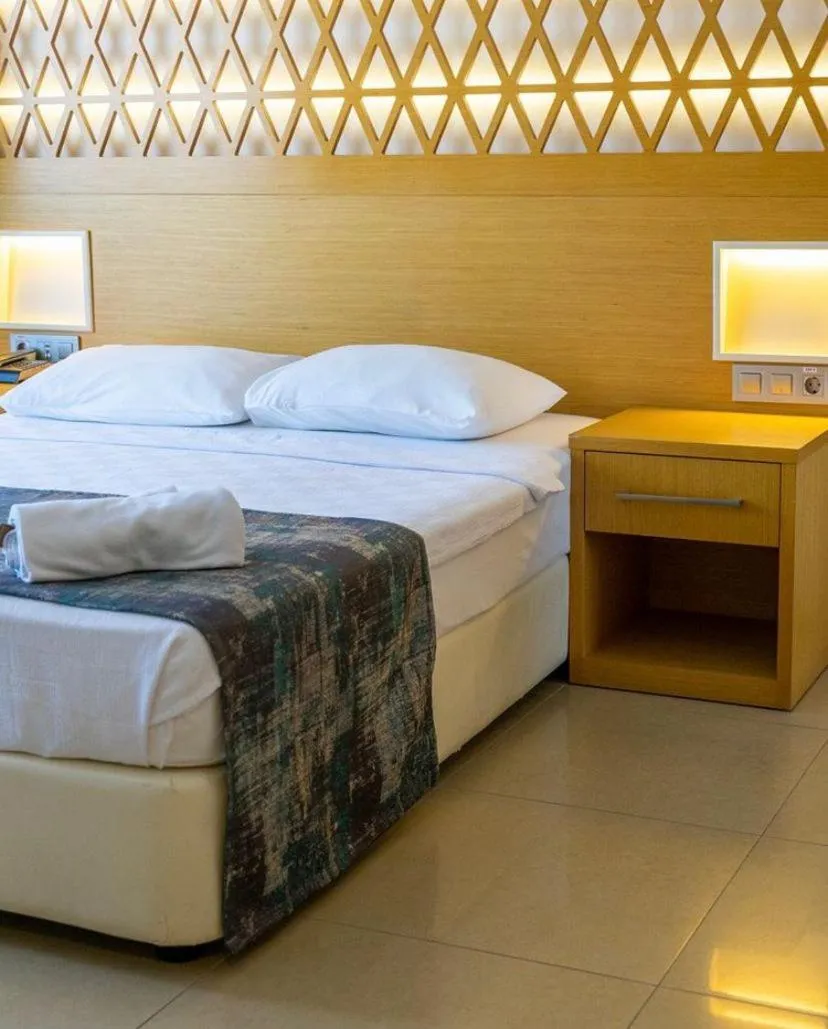 Bed in Aurasia Design Hotel