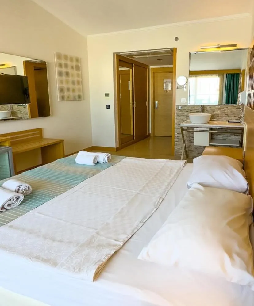 Bed in Aurasia Design Hotel