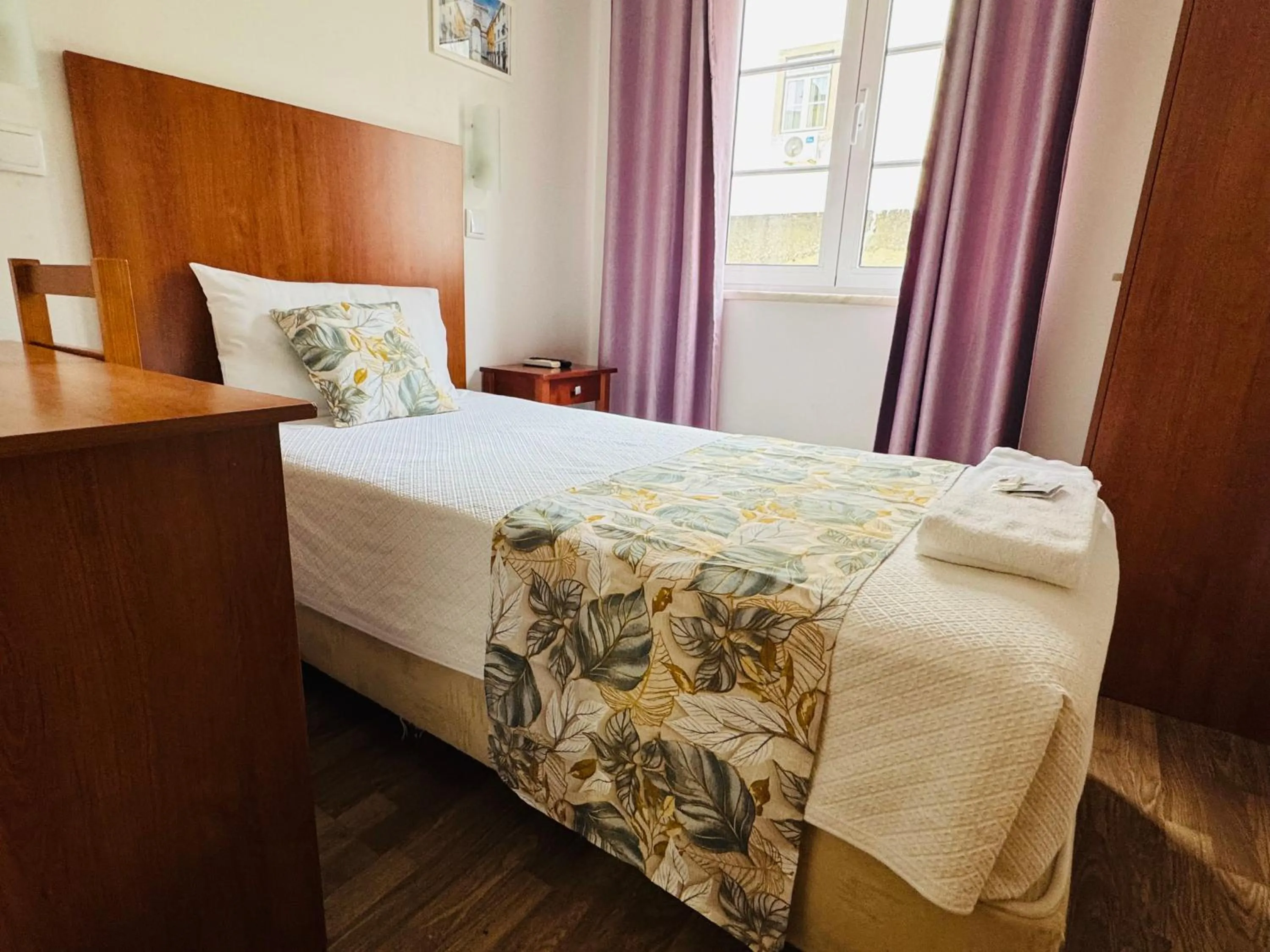 Bed in Residencial Camoes