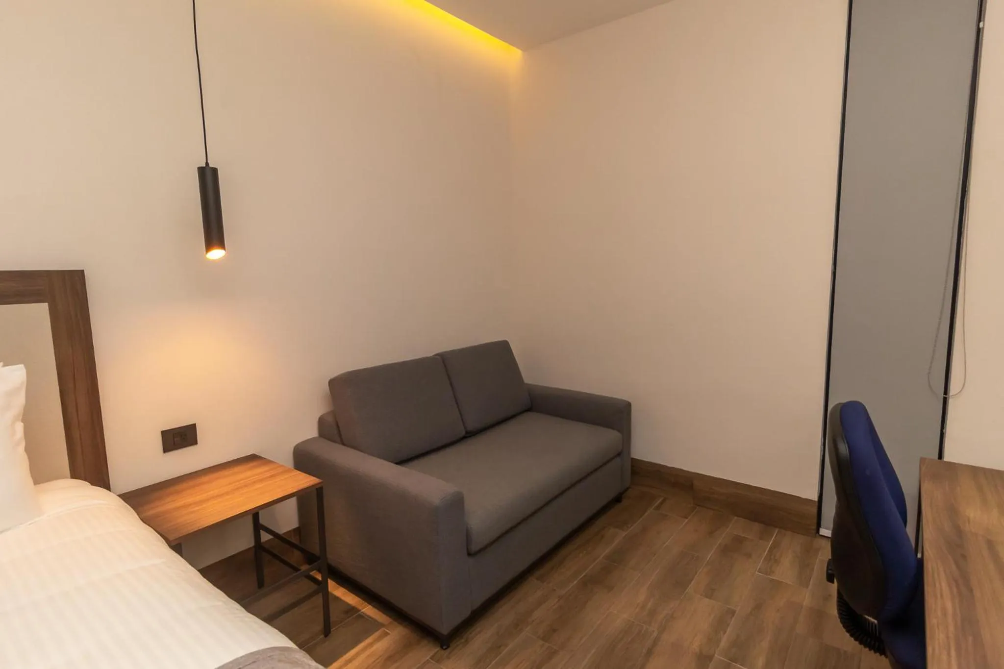 Seating area, Bed in Hoteles Piedra Alta by De Los Perez