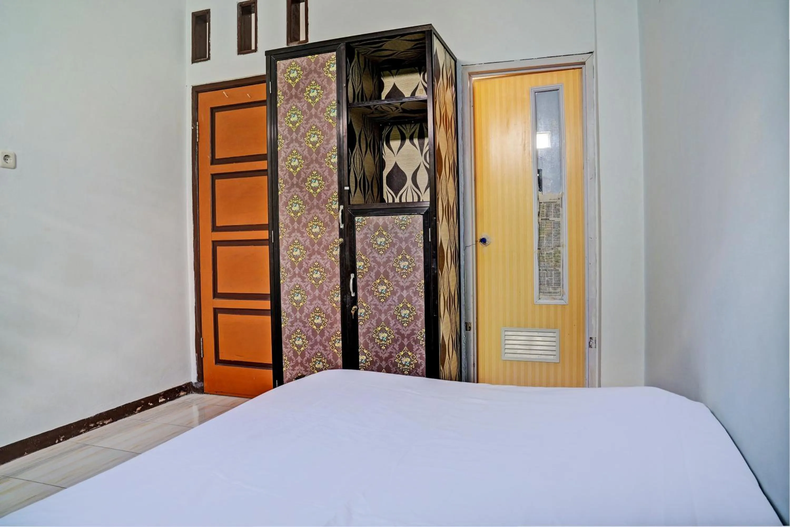Bedroom in Hotel O Penginapan Hj Lilis 2 Syariah