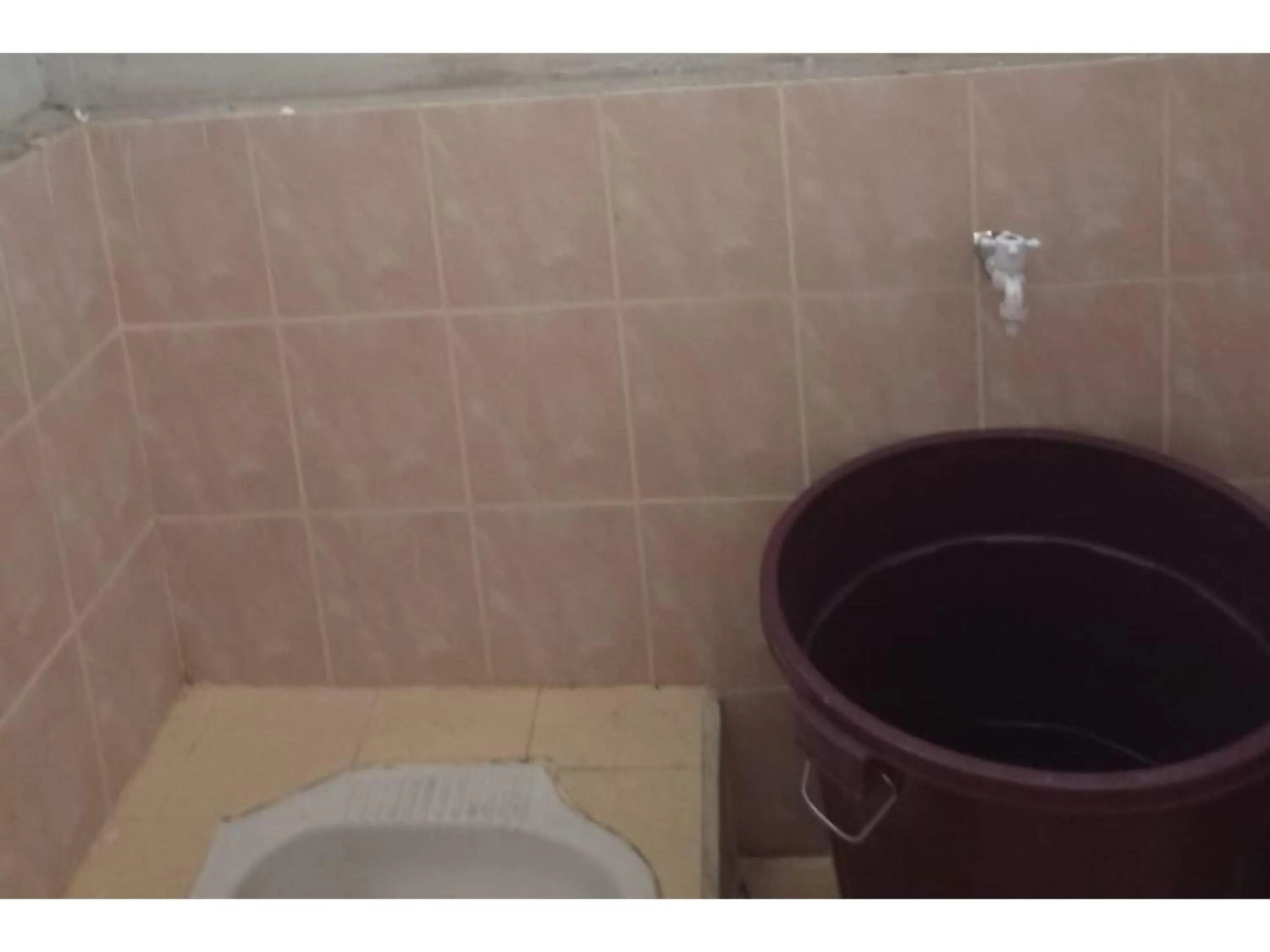 Bathroom in Hotel O Lona Guest House SyariahNearScience Park Universitas Riau