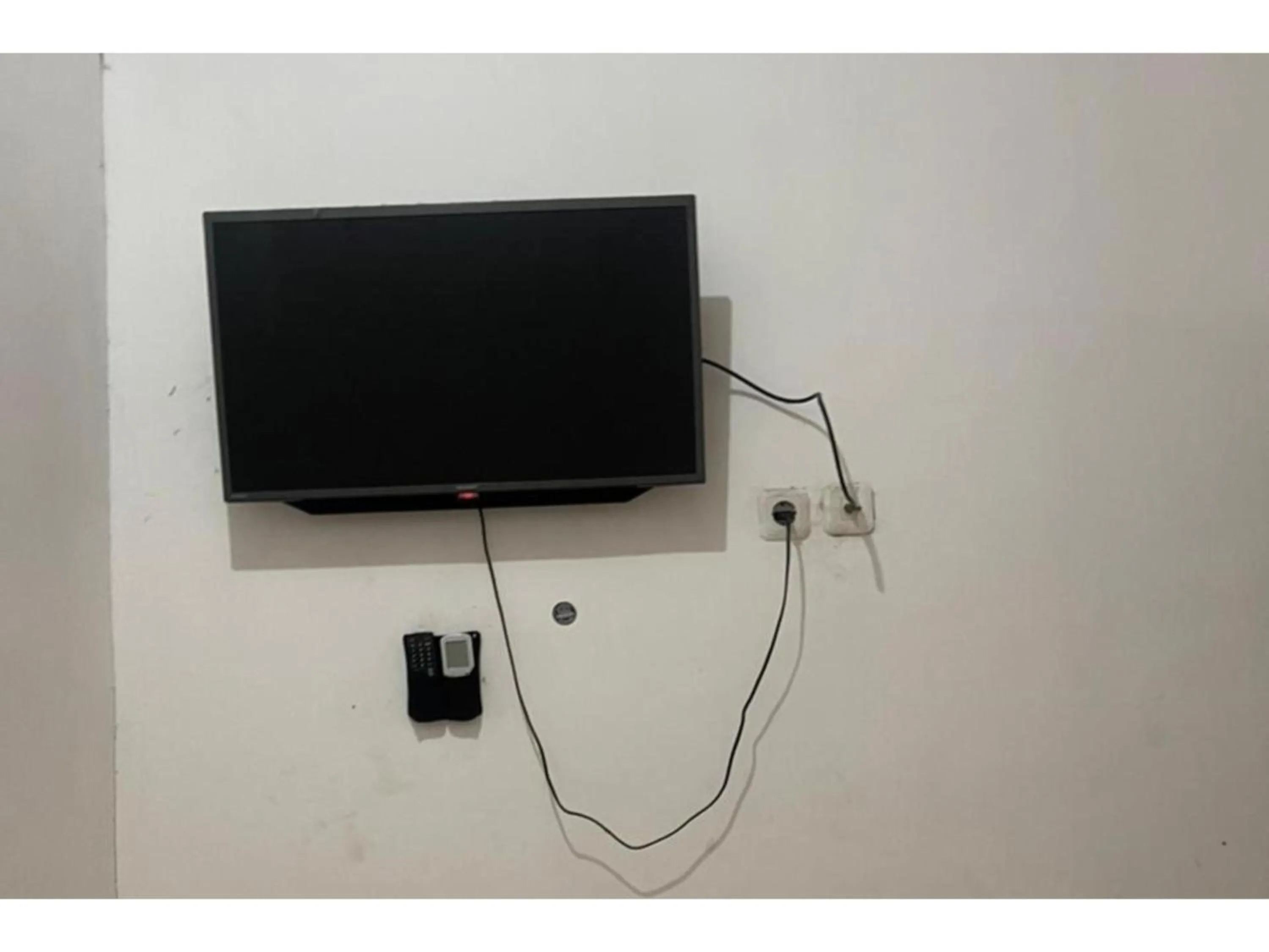 TV and multimedia in Hotel O Lona Guest House SyariahNearScience Park Universitas Riau