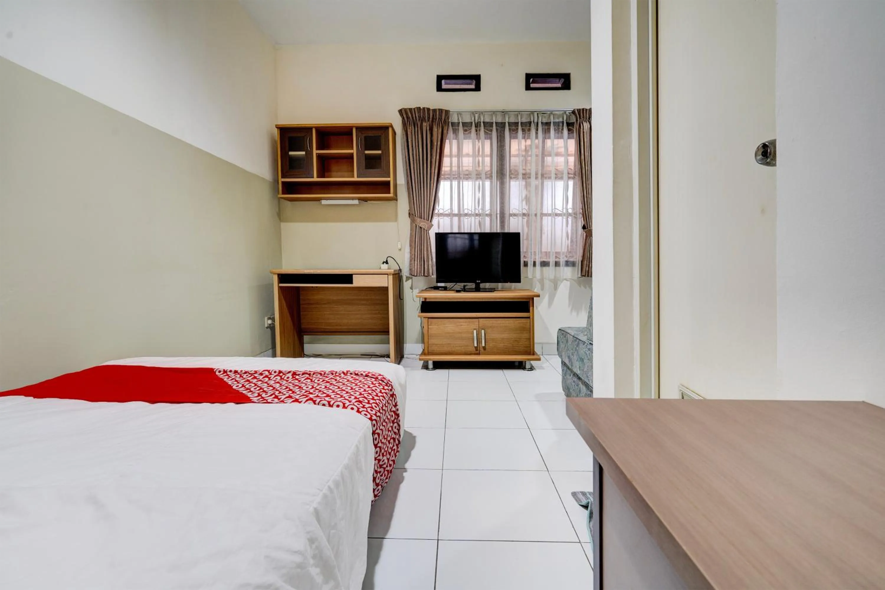 Bedroom in Hotel O Sukamulya Homestay