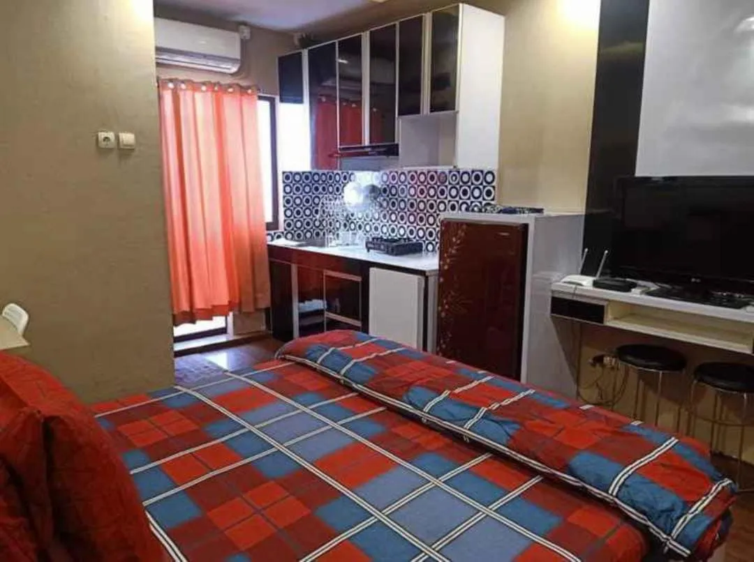 Deluxe Double Room in Hotel O Apartement Sentraland Karawang By Gs