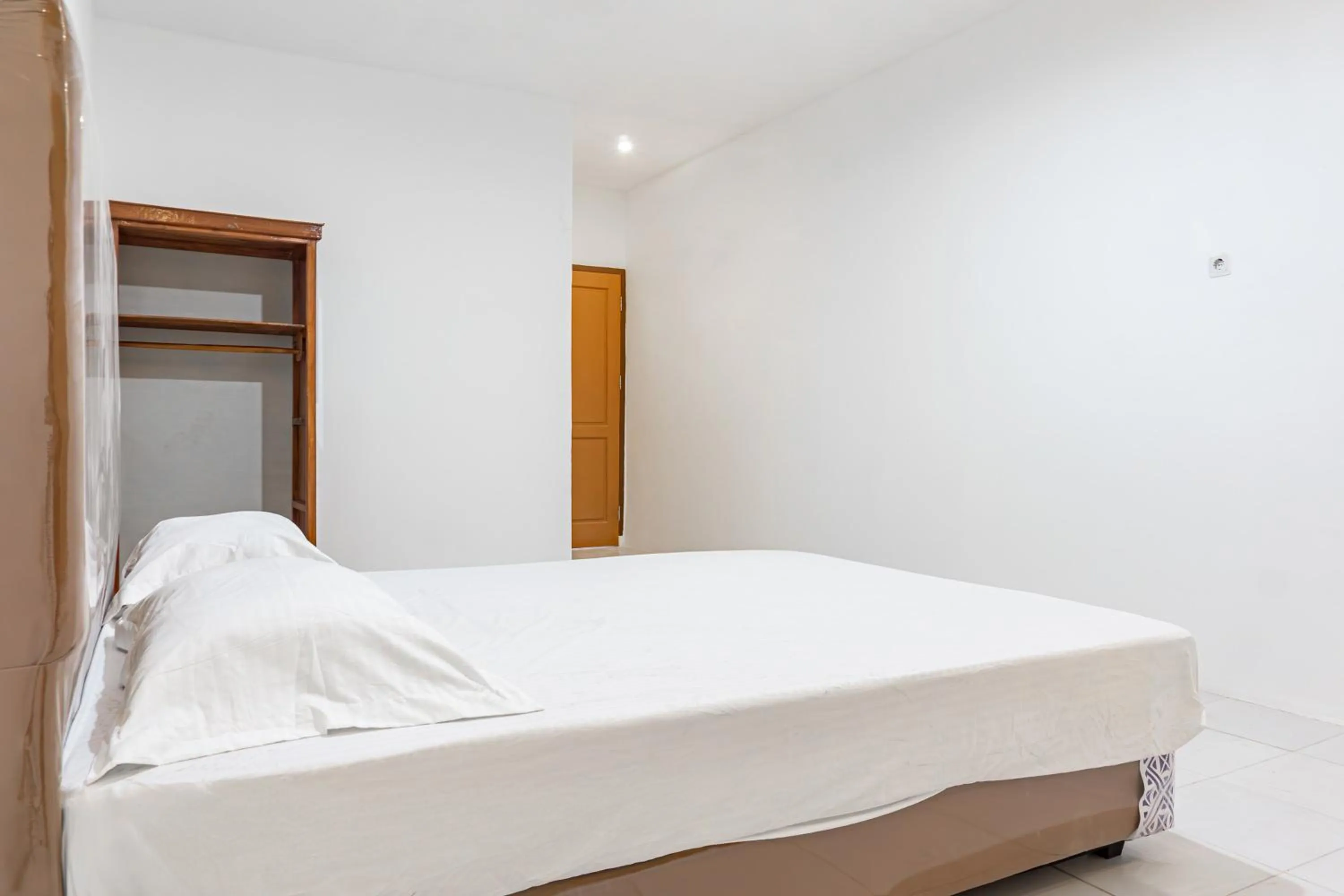 Bedroom, Bed in Hotel O Enjoy Homestay & Cafe