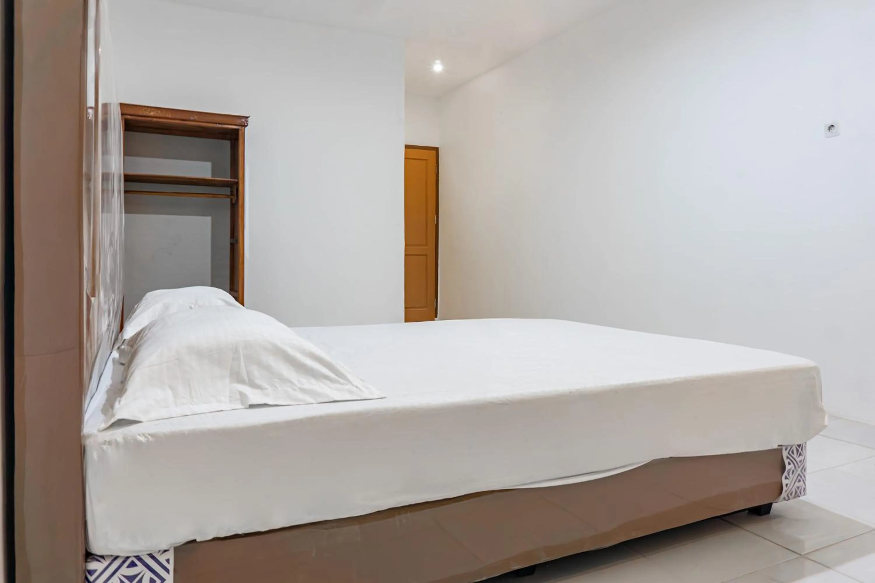 Bedroom, Bed in Hotel O Enjoy Homestay & Cafe