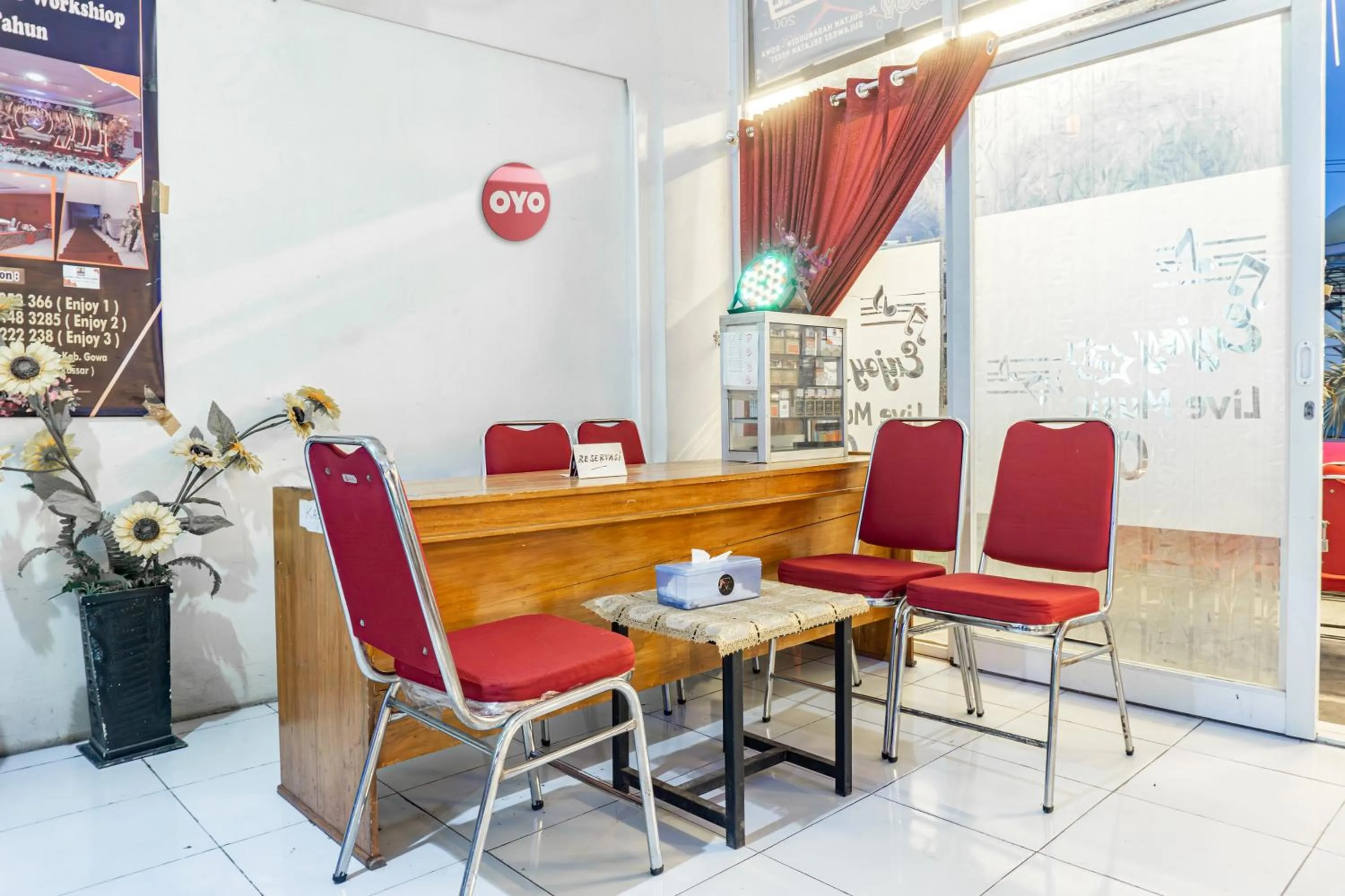 Lobby or reception in Hotel O Enjoy Homestay & Cafe