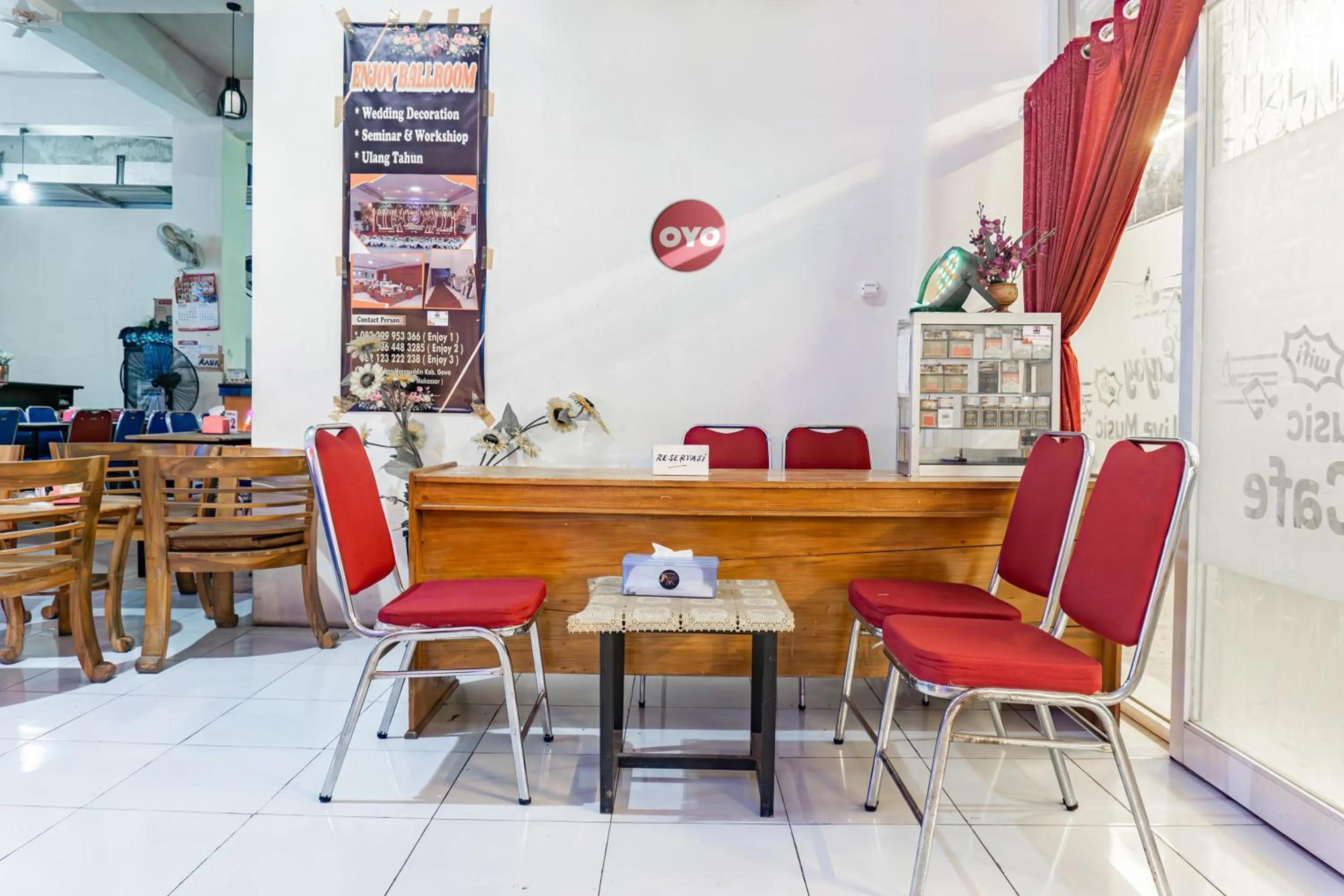 Lobby or reception in Hotel O Enjoy Homestay & Cafe