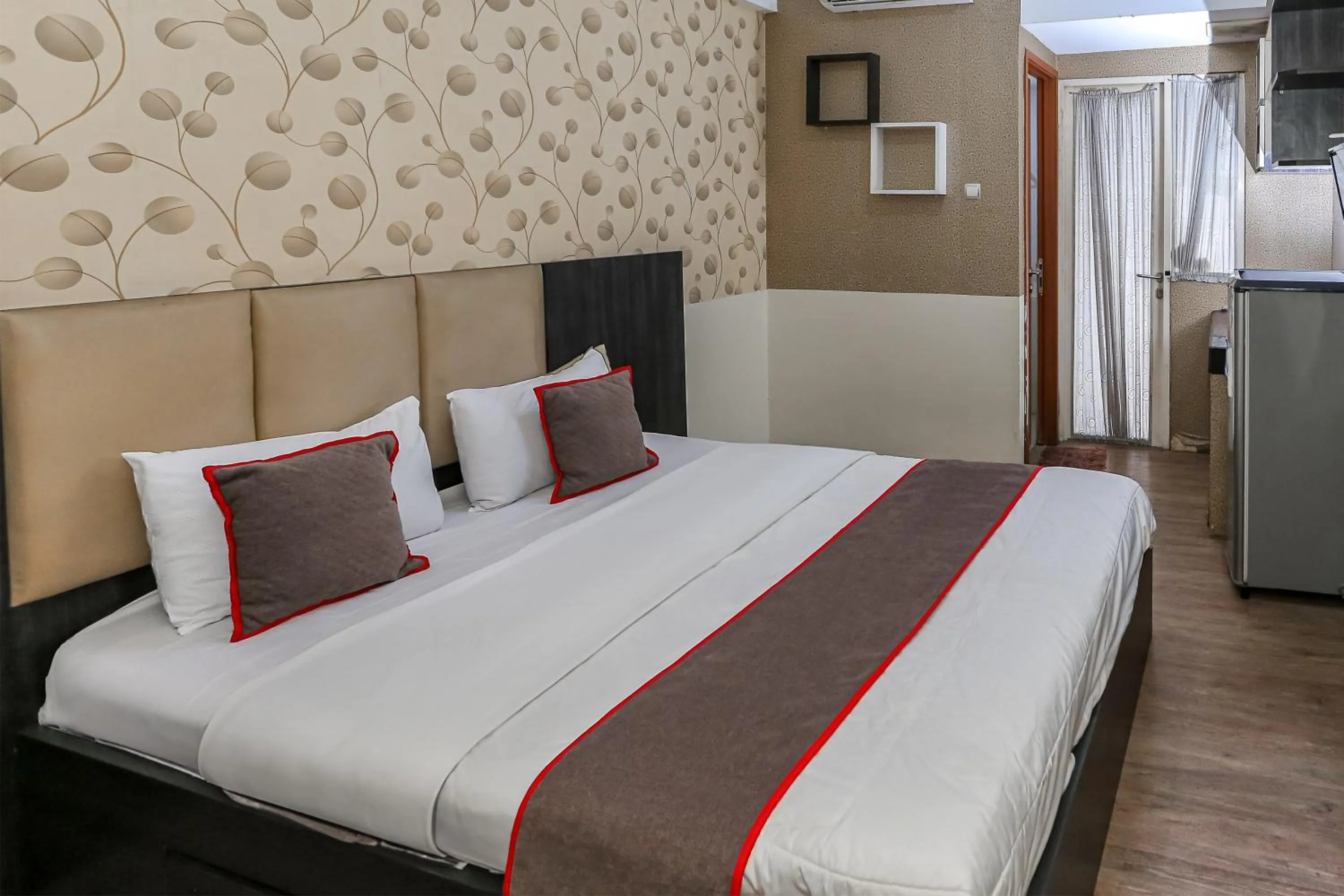 Bedroom, Bed in Capital O 93372 Aurora Residence