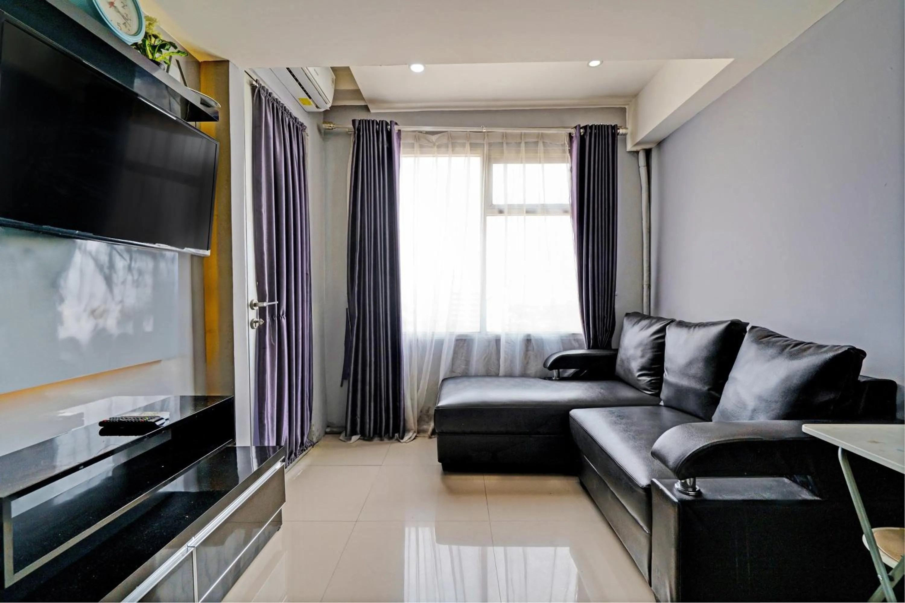 Bedroom in Hotel O Apartement Grand Sentraland By Rai Property