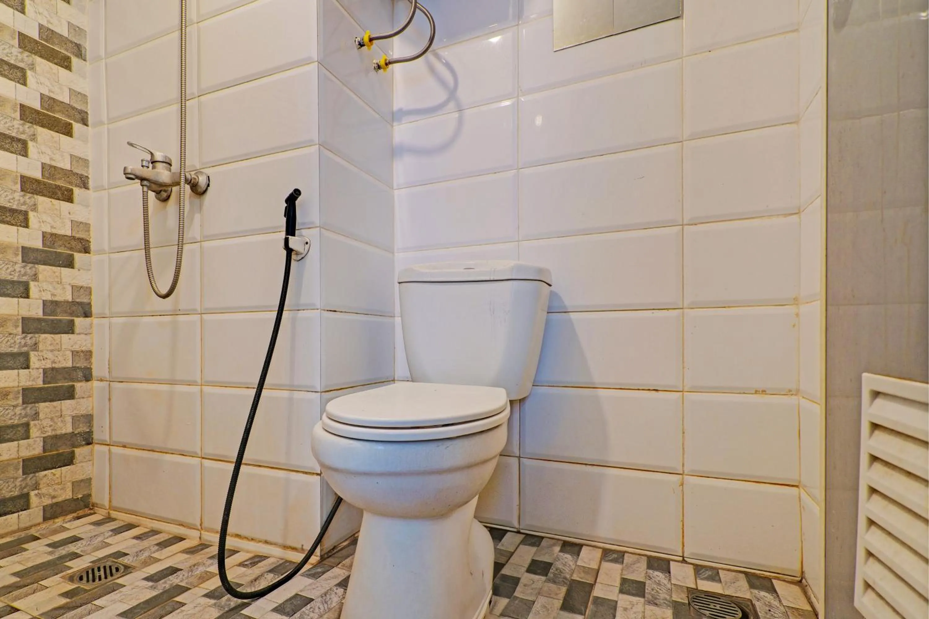 Bathroom in Hotel O Apartement Grand Sentraland By Rai Property