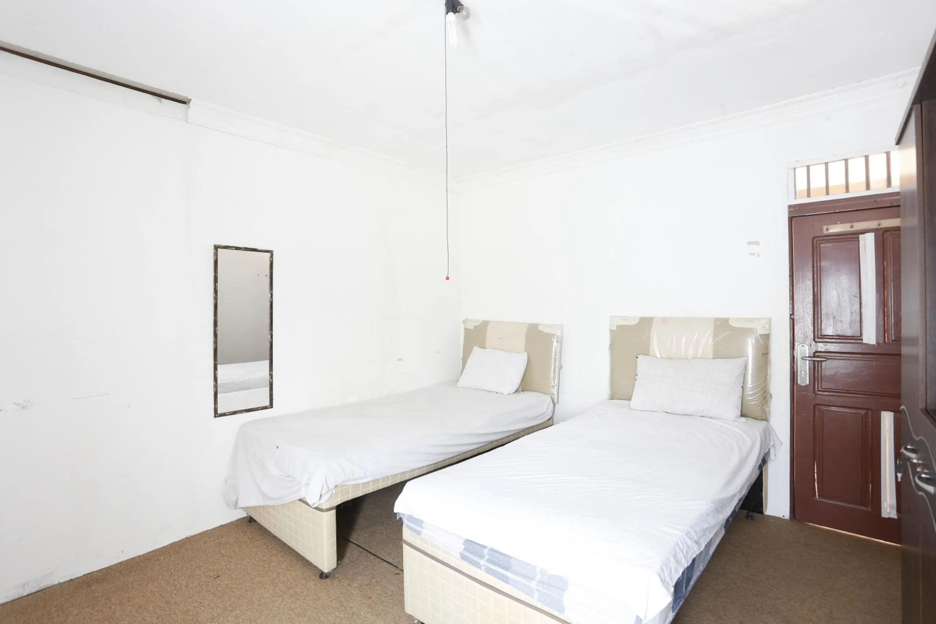 Bedroom, Bed in Hotel O Penginapan Mangkoe Barokah