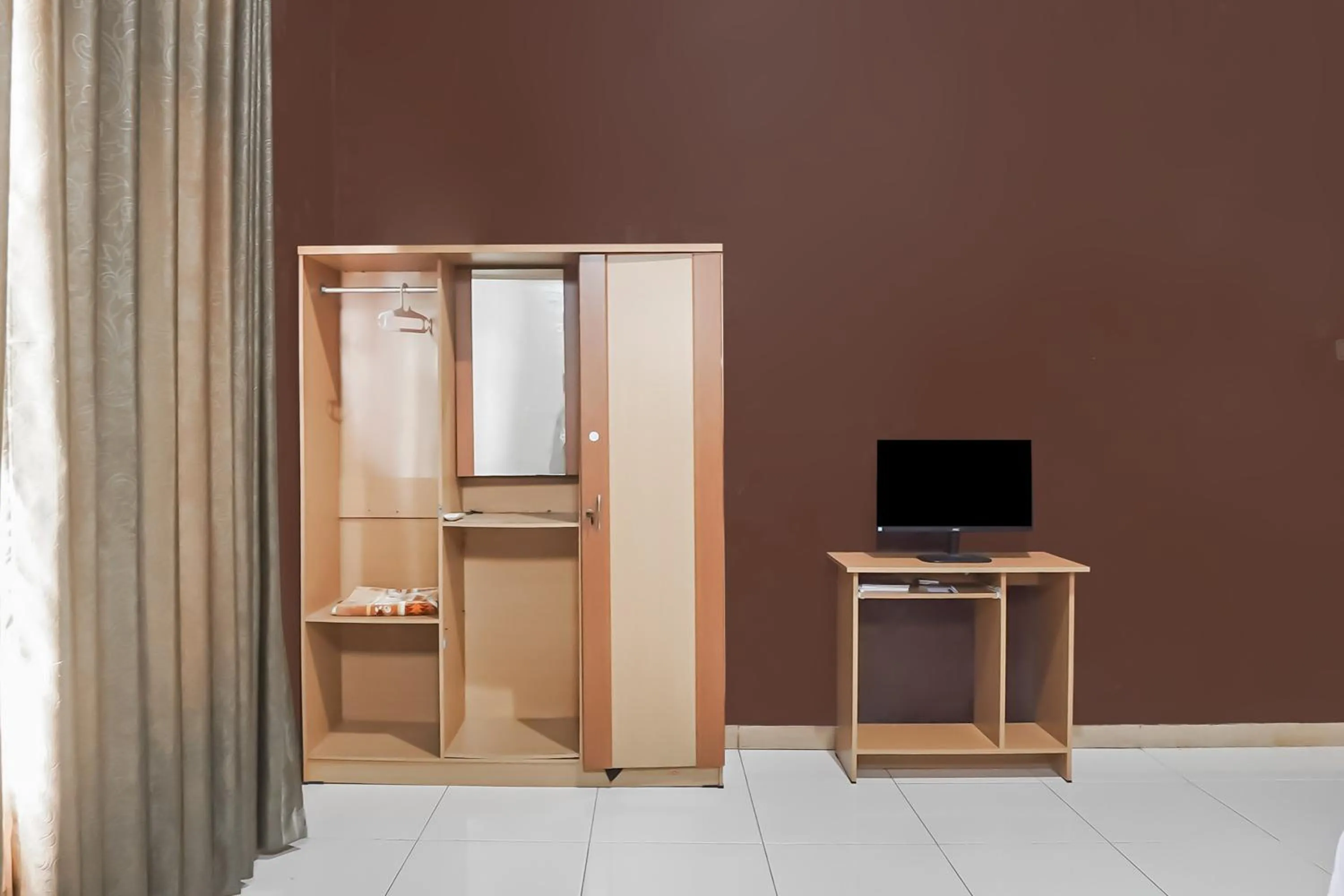 Bedroom in Hotel O Pondok Tawing Rumbih