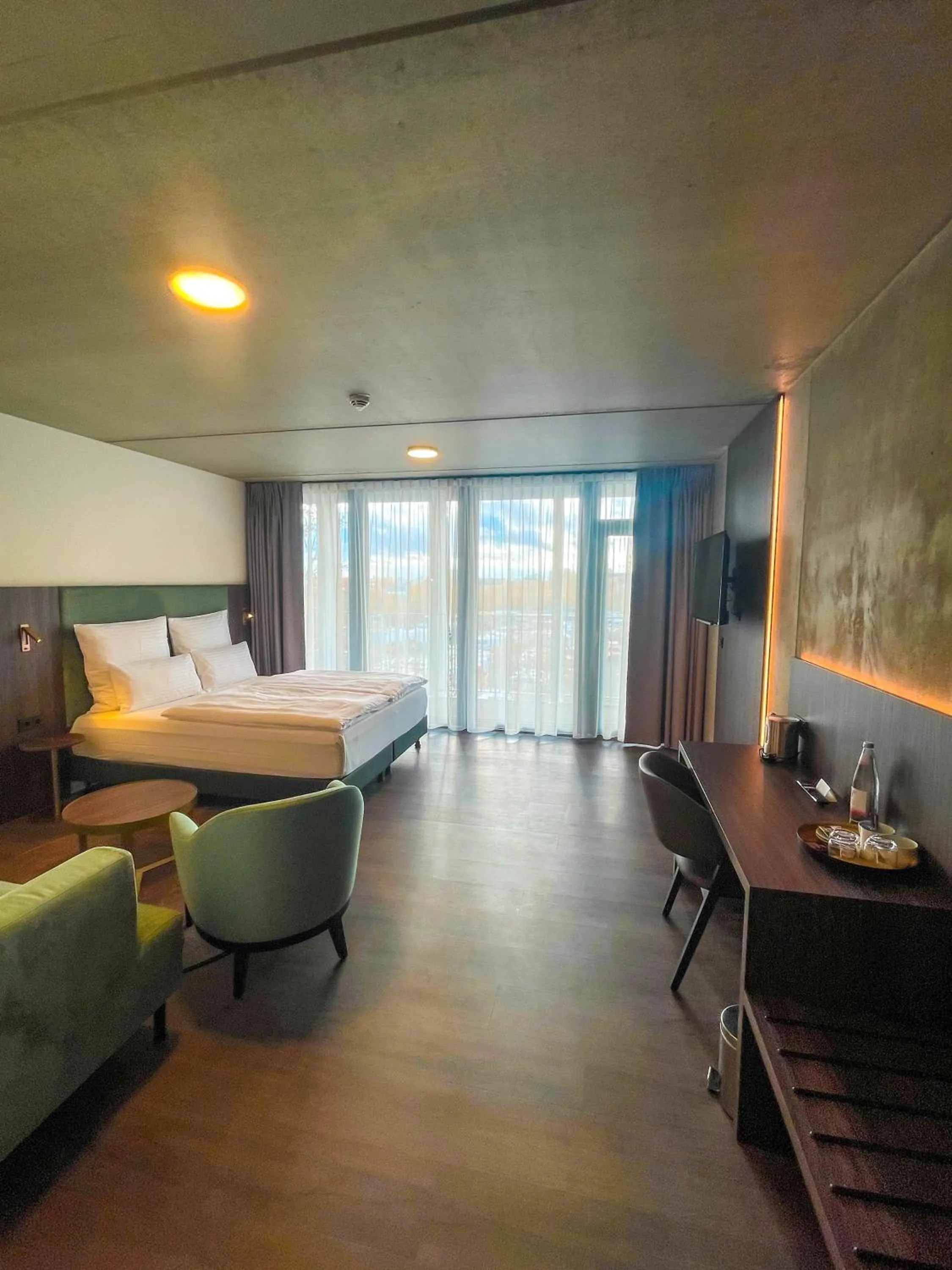Bed in DX Apartments
