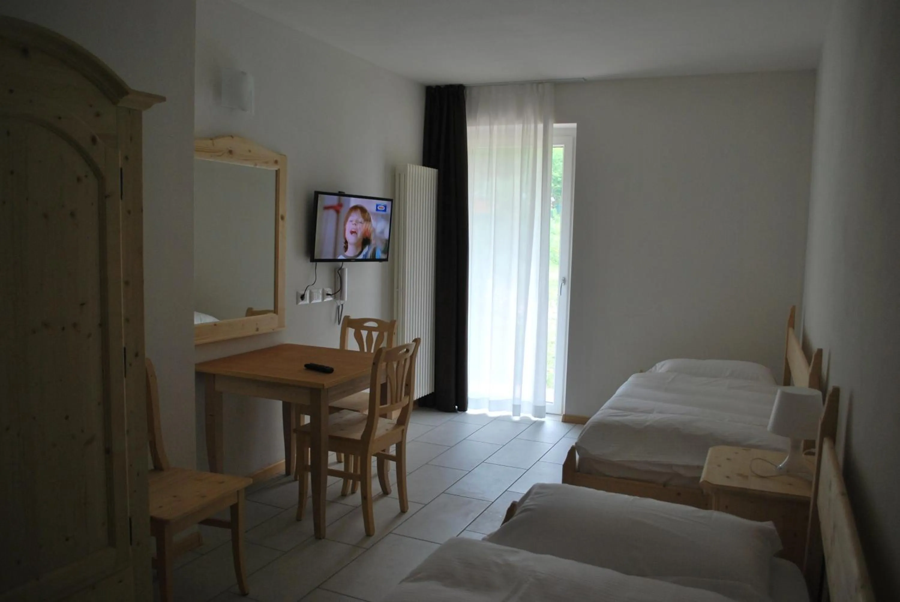 TV and multimedia, Bed in Hotel Elbele Garnì