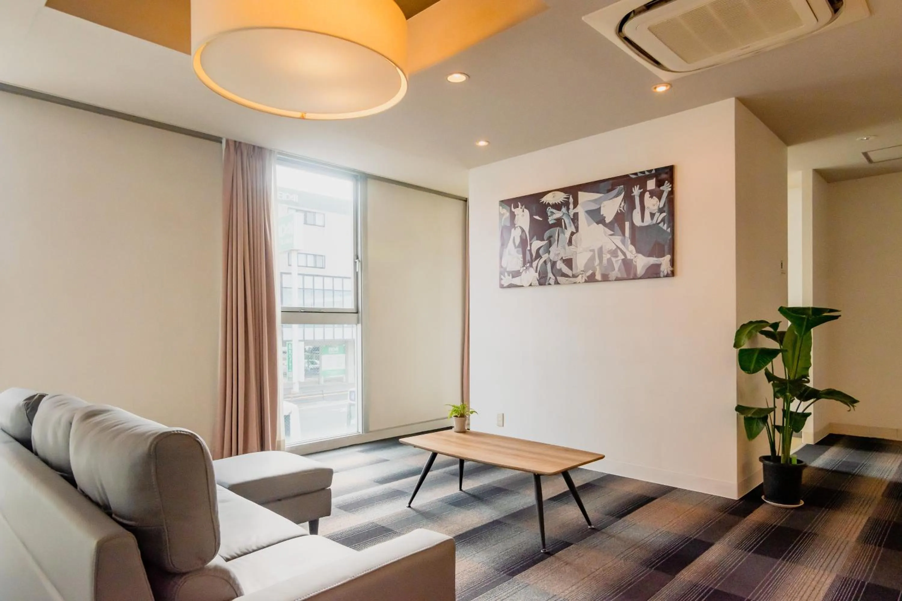 Seating area in Fukuoka Share Hotel