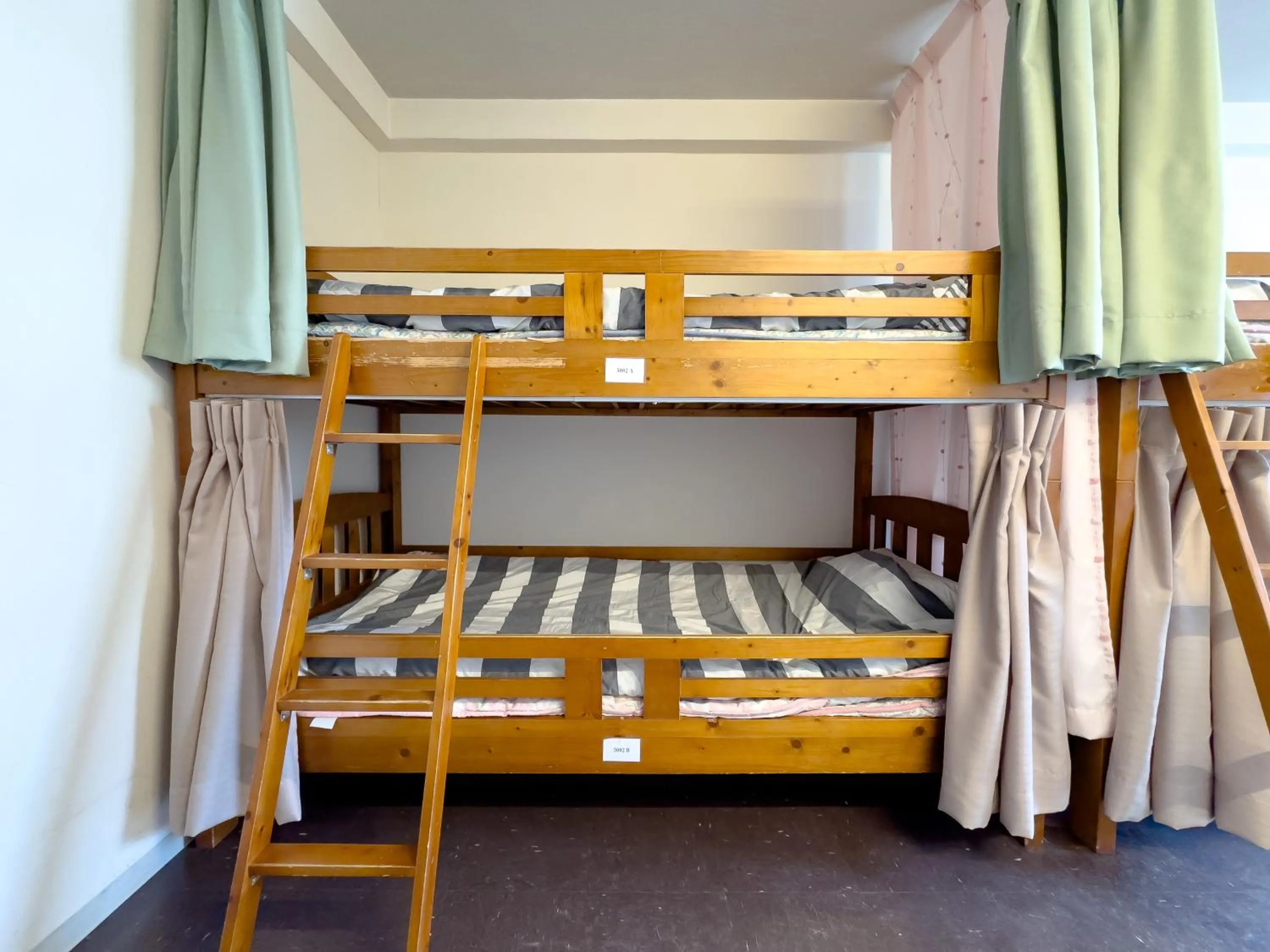 Bedroom, Bed in Fukuoka Share Hotel