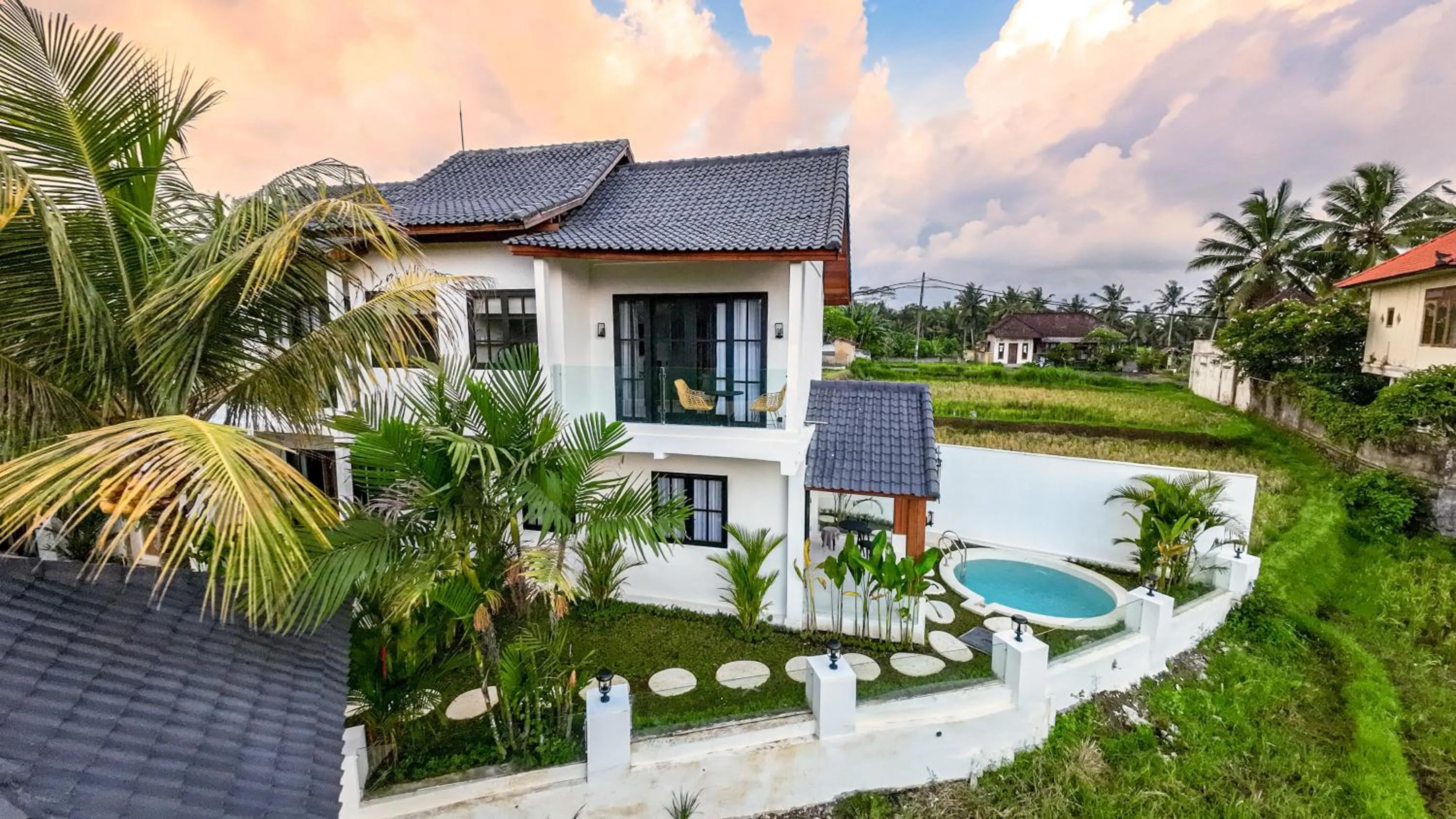 Property building in Sarang Apartments by EVDEkimi - Rice field escape with Yoga lounge, Lush garden - Long stay extras