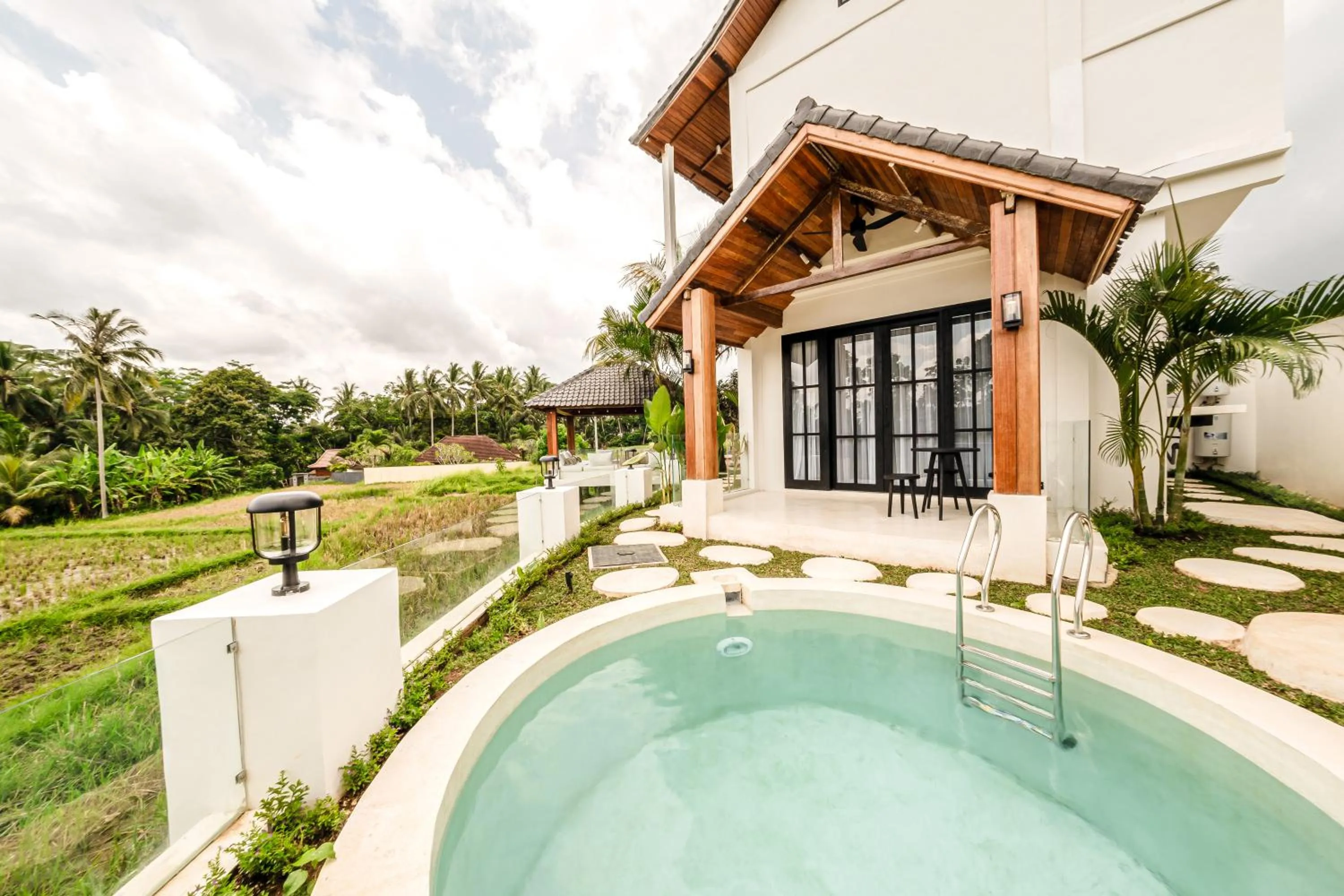 Property building in Sarang Apartments by EVDEkimi - Rice field escape with Yoga lounge, Lush garden - Long stay extras