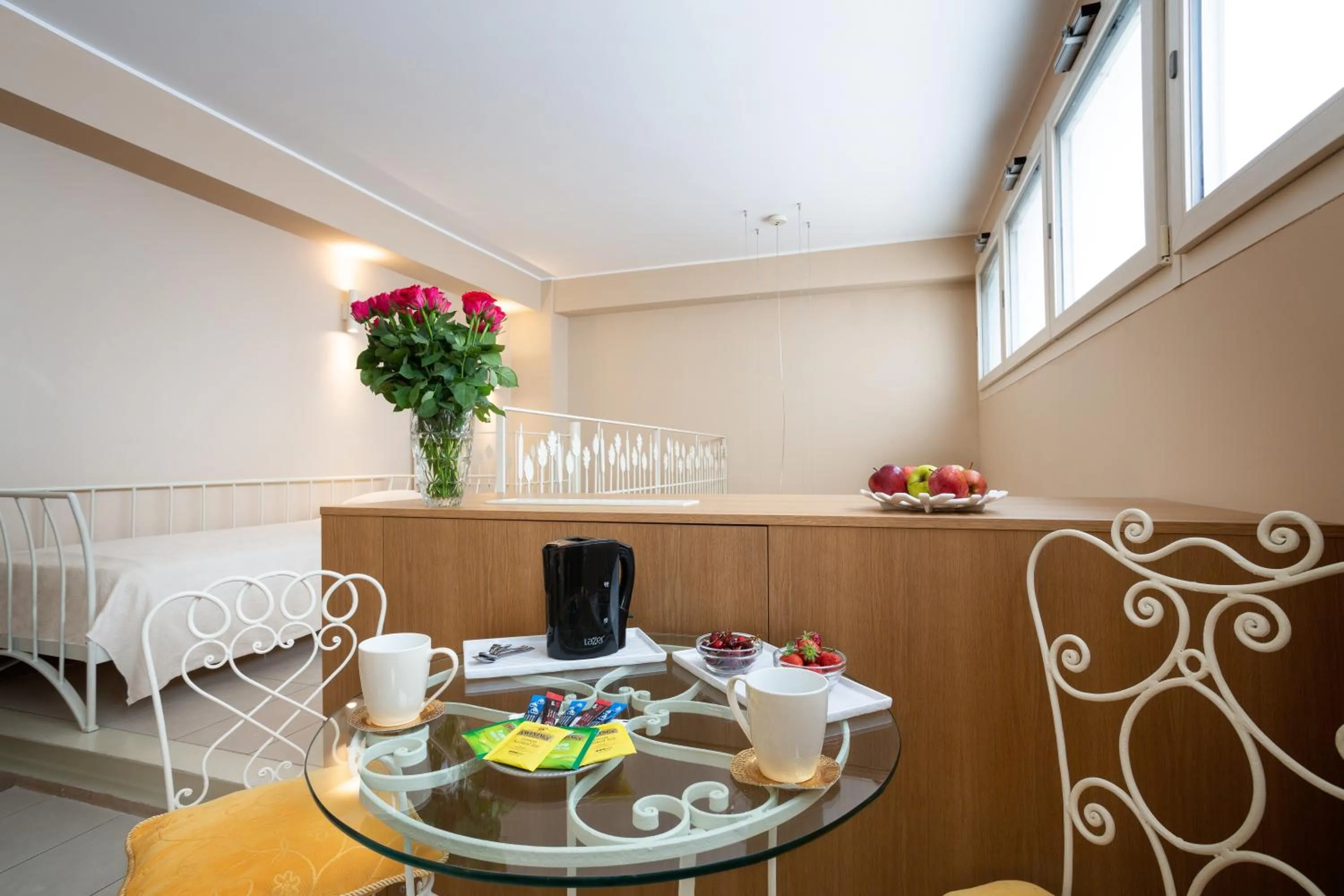 Seating area in La Castellana Loft Hotel