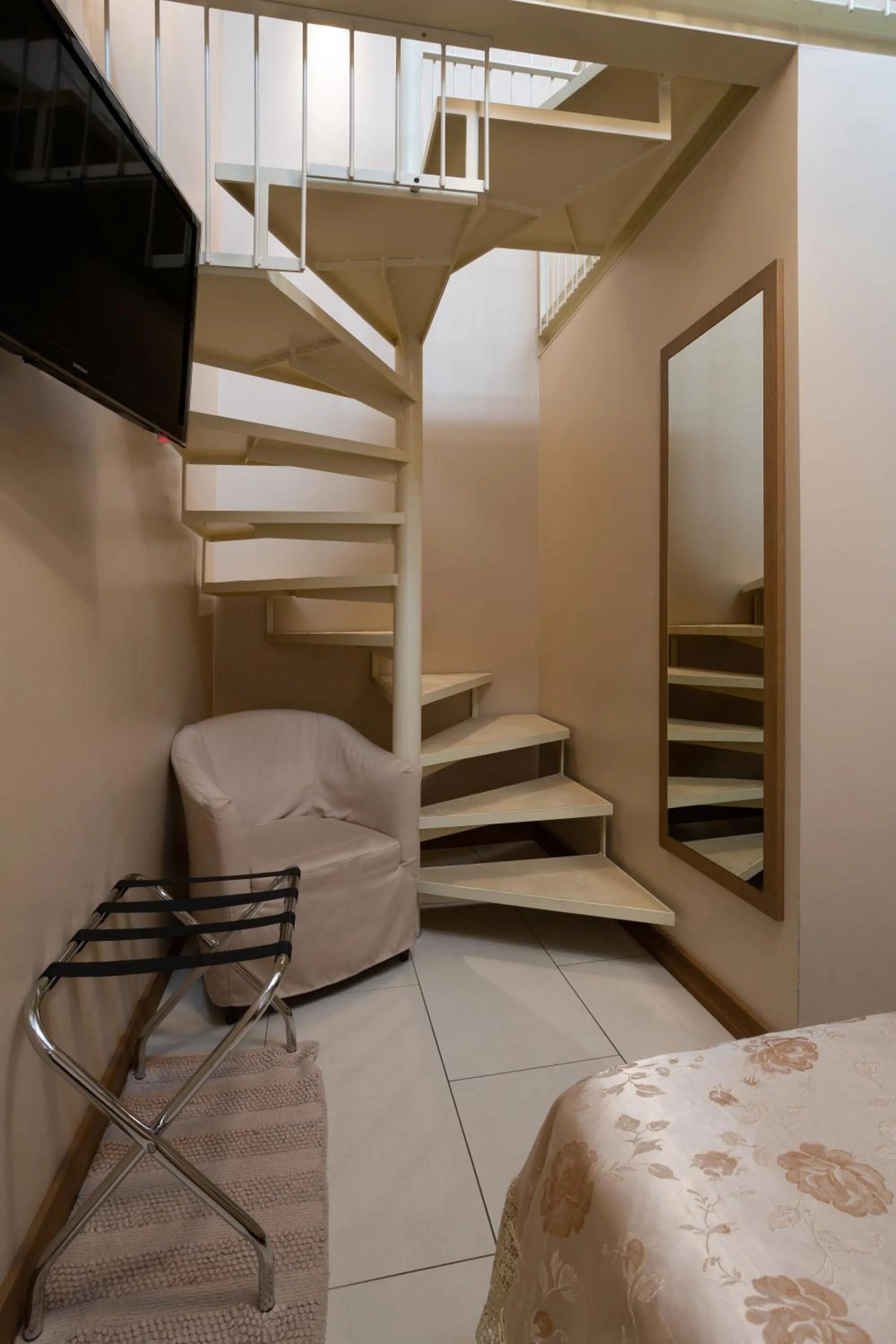 Photo of the whole room in La Castellana Loft Hotel