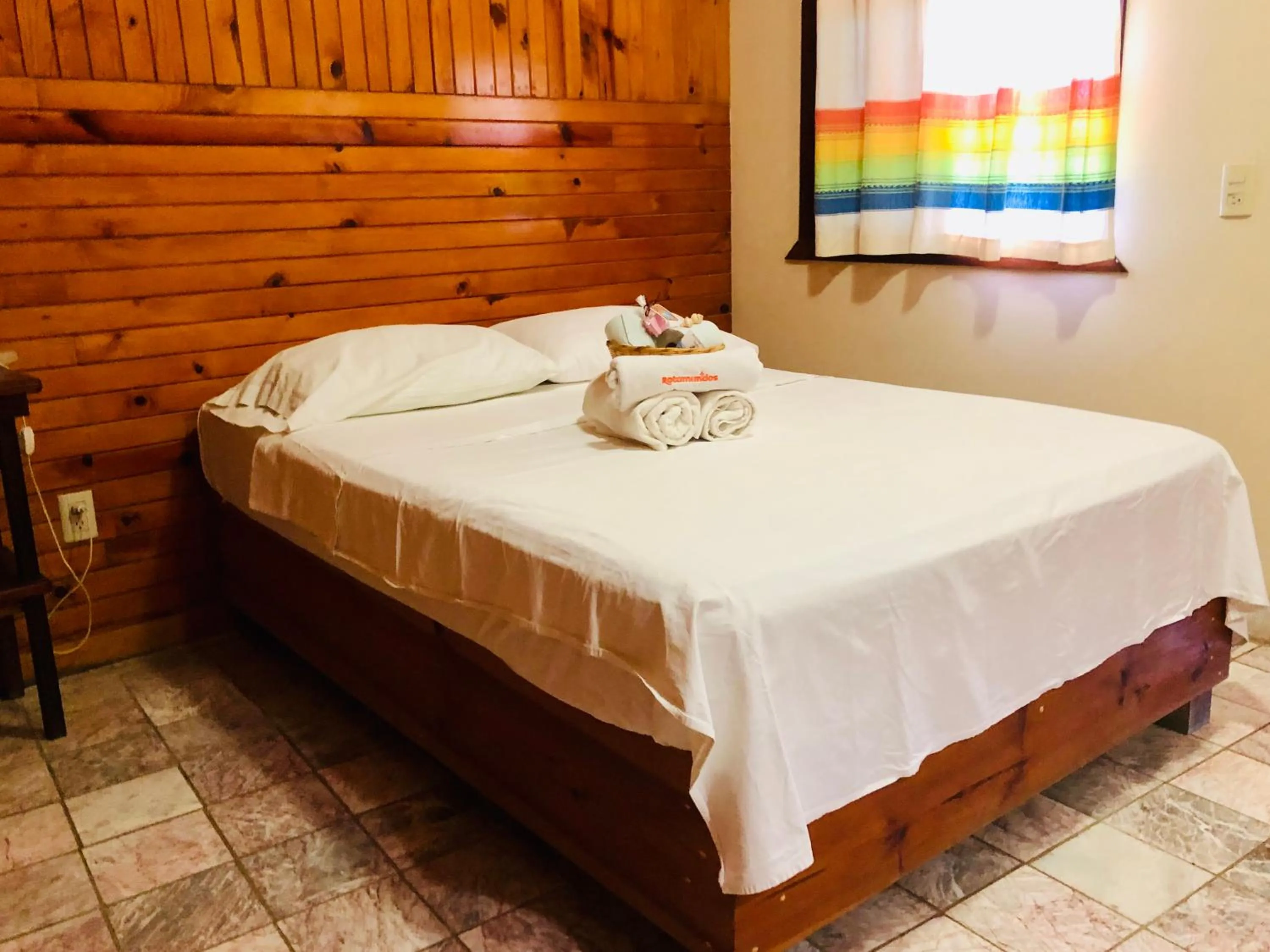 Bed in Hotel Paraíso del Pescador by Rotamundos