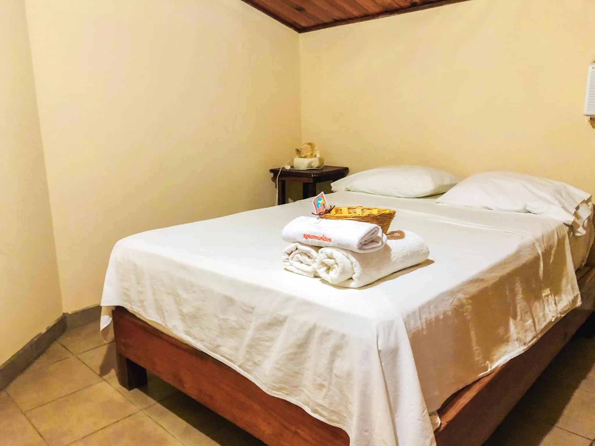 Bed in Hotel Paraíso del Pescador by Rotamundos