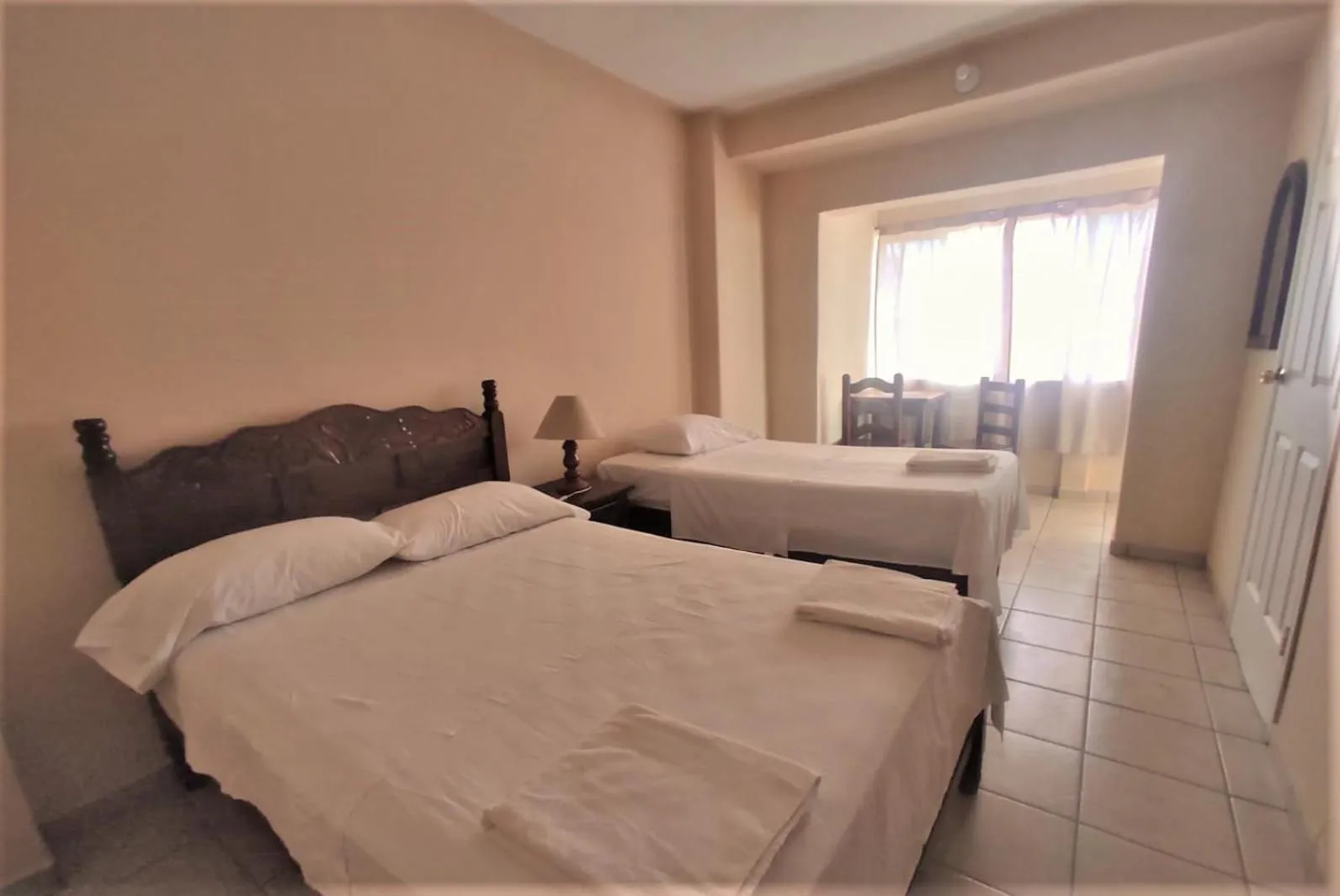 Bed in Hotel Paraíso del Pescador by Rotamundos